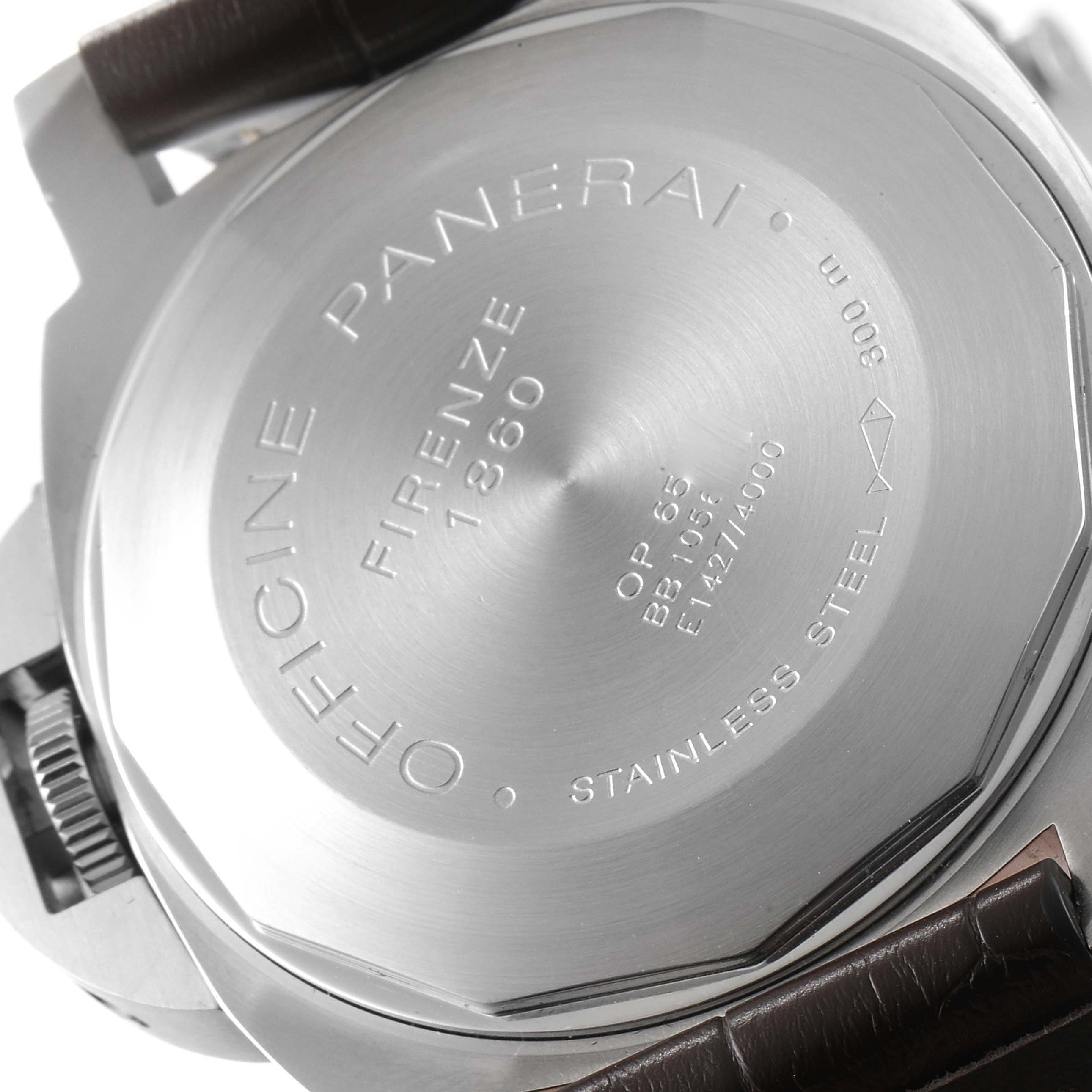 The image shows the back case of a Luminor model by Panerai, displaying branding and product details.