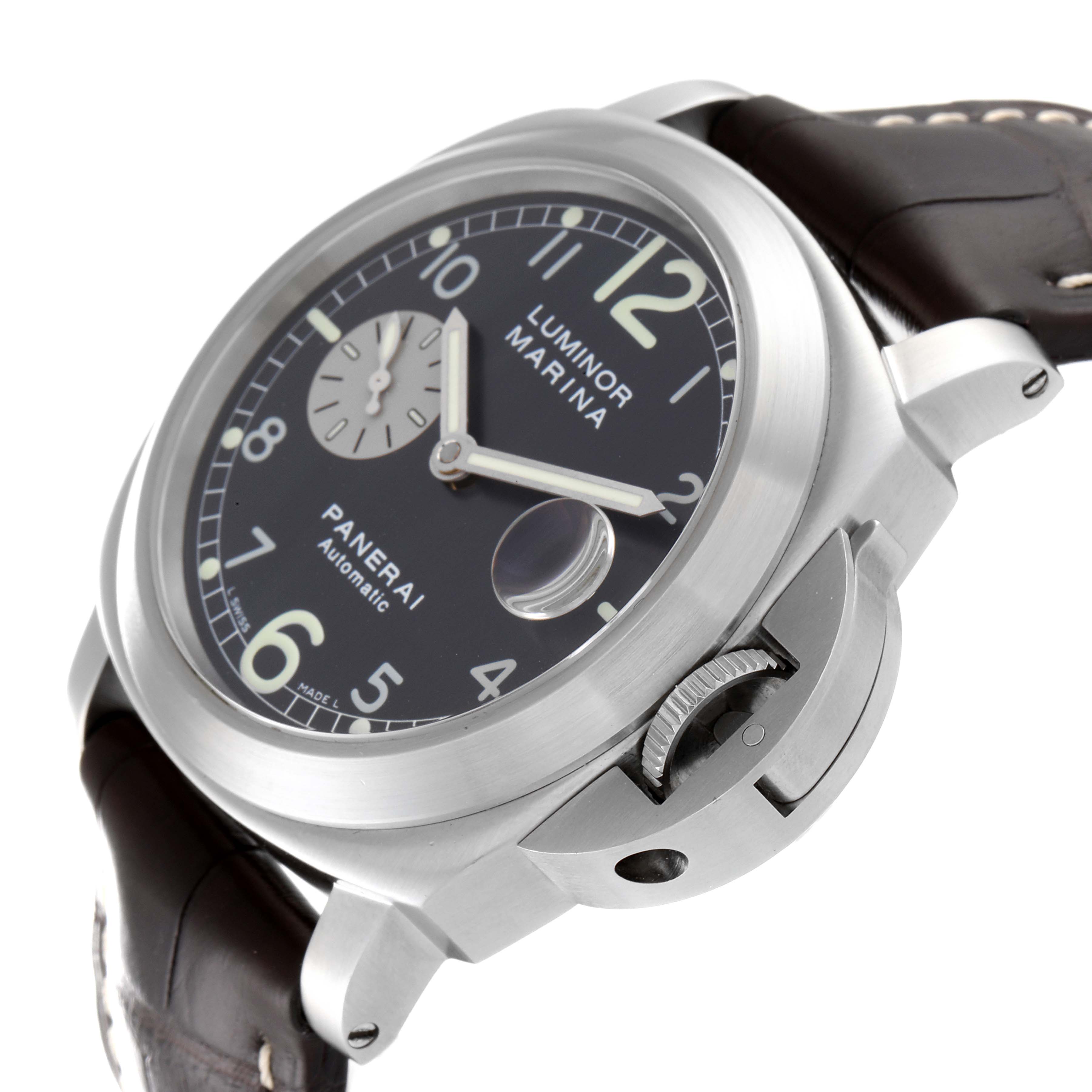 The image shows a Panerai Luminor PAM00086 Men
s Stainless Steel Black Dial PAM00086 Men
s Stainless Steel Black Dial Marina watch from an angled close-up, highlighting the dial, crown guard, and part of the strap.