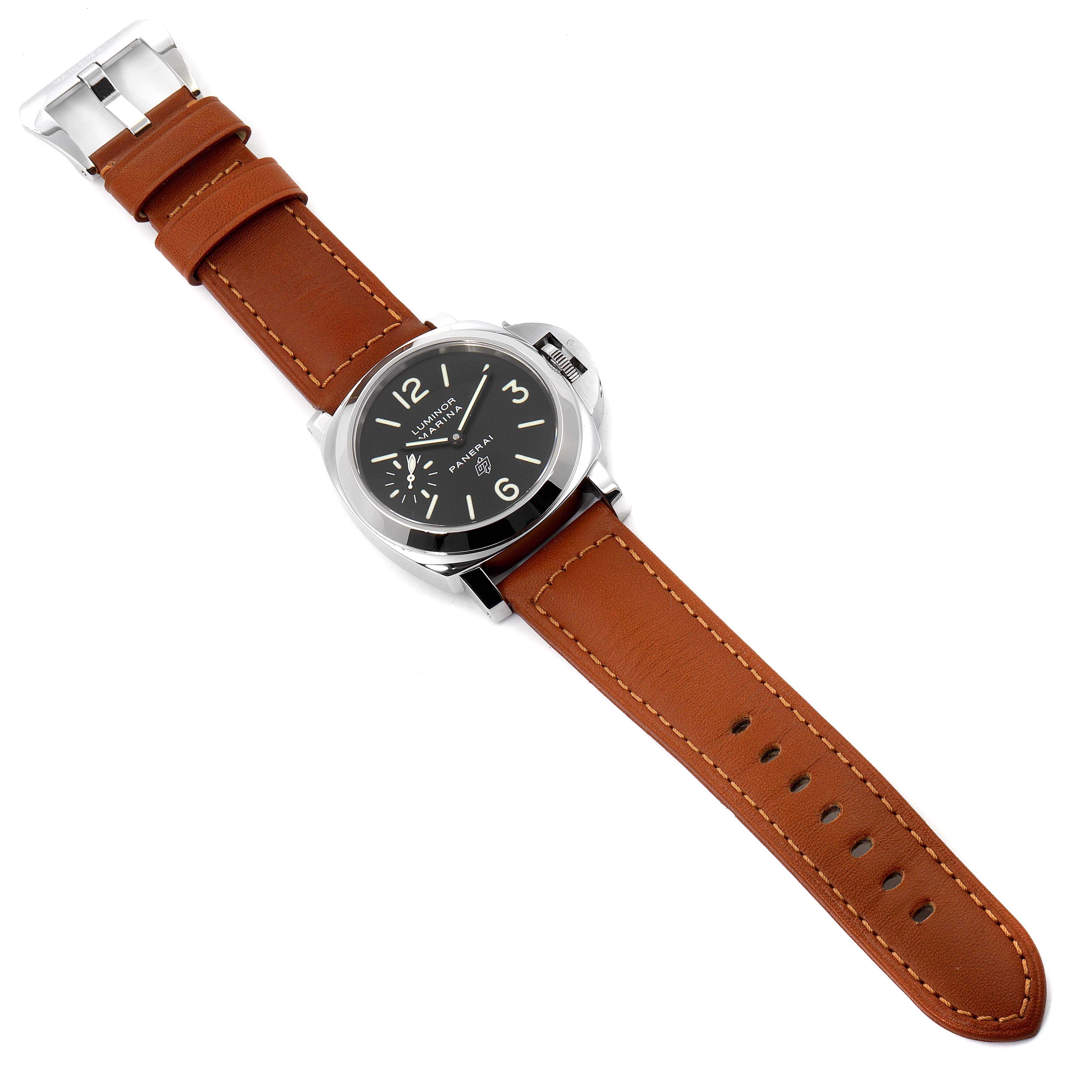 The image shows an overhead view of the Luminor model by Panerai, featuring a brown leather strap and black dial.