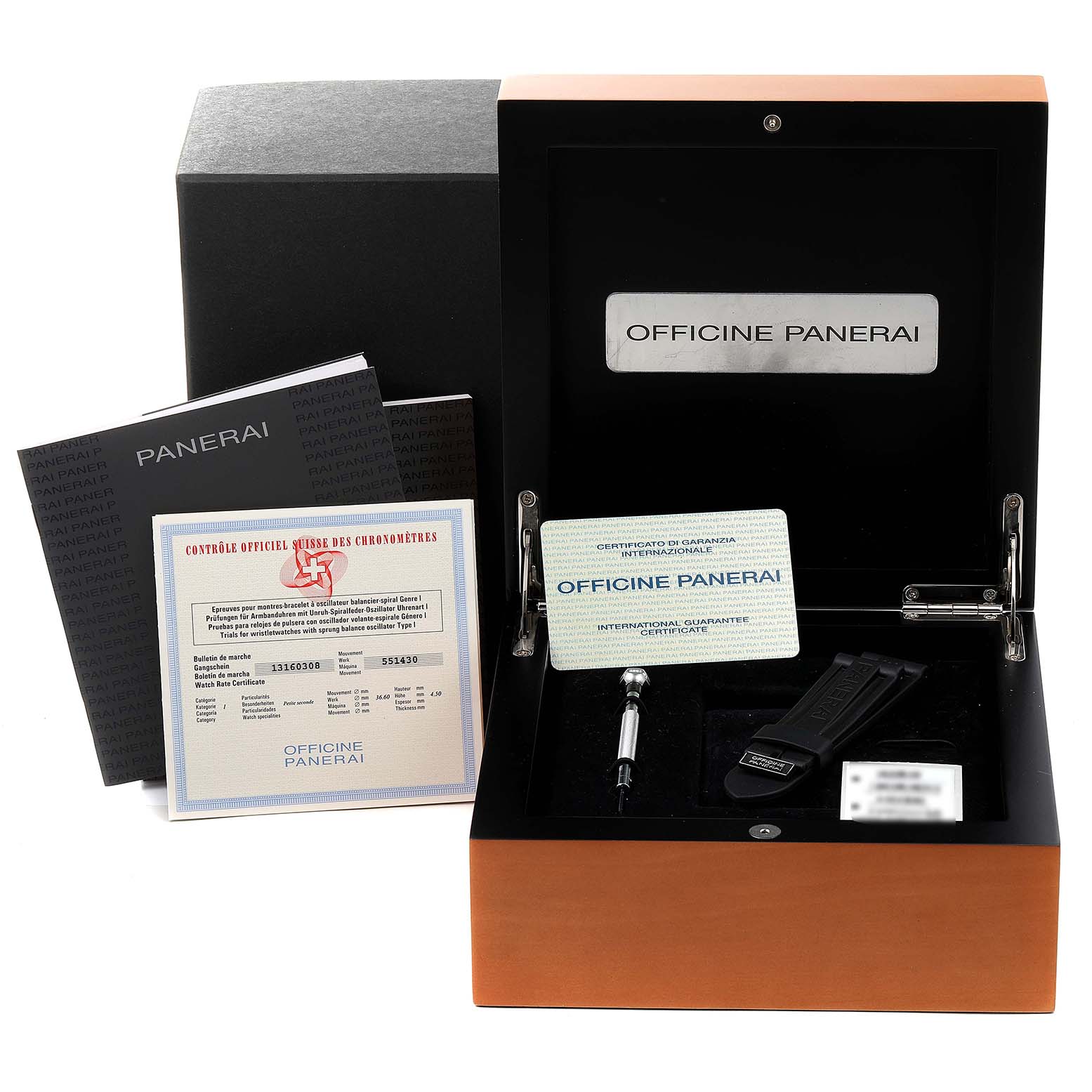 The image shows an open box of a Panerai Luminor PAM00005 Men's Stainless Steel Black Dial PAM00005 Men's Stainless Steel Black Dial watch with accessories and documentation arranged neatly inside and around the box.