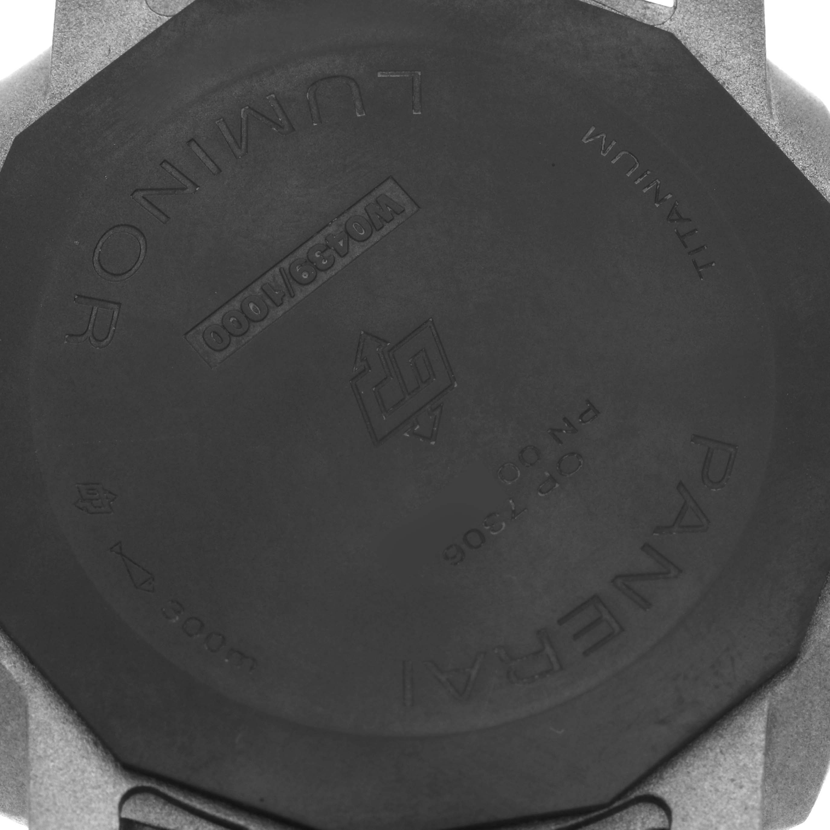 The image shows the back case of a Panerai Luminor PAM01662 Men's Titanium Grey Dial PAM01662 Men's Titanium Grey Dial watch, displaying engravings and material details.