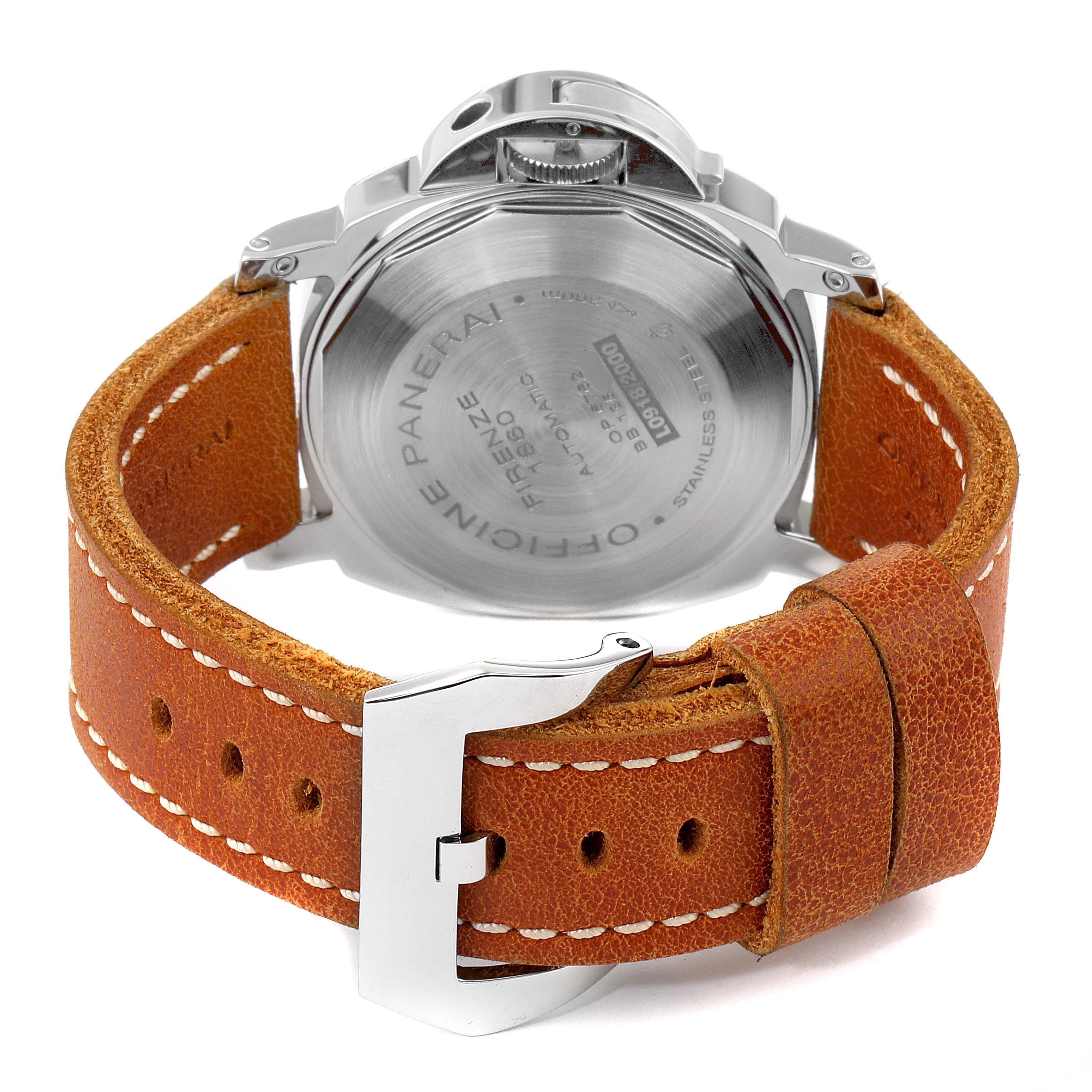 The image shows the back view of the Panerai Luminor PAM00090 Men
s Stainless Steel Black Dial PAM00090 Men
s Stainless Steel Black Dial watch, focusing on its case back, crown, and brown leather strap with a buckle.