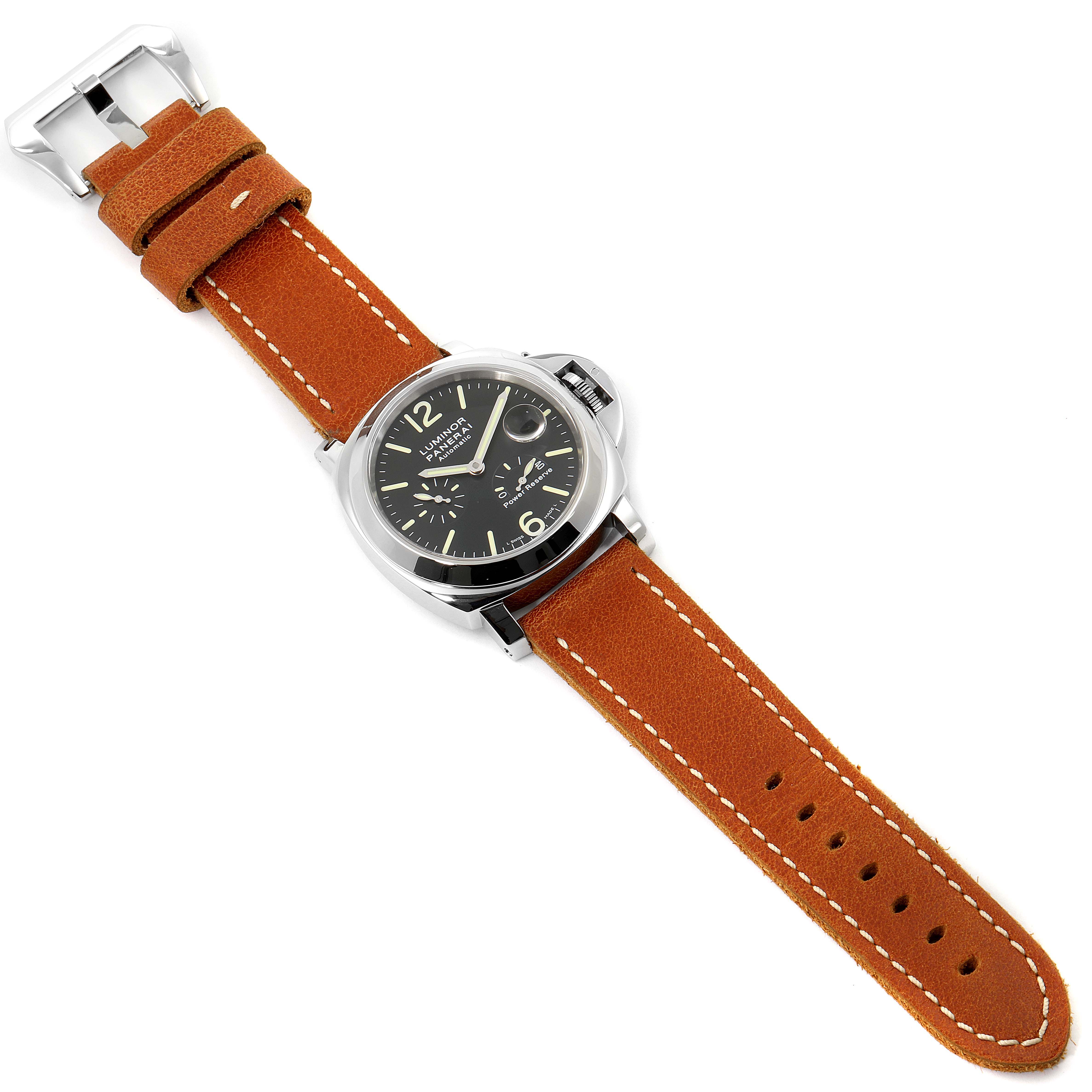 The image shows a top-down view of a Panerai Luminor PAM00090 Men
s Stainless Steel Black Dial PAM00090 Men
s Stainless Steel Black Dial watch with a brown leather strap and a black dial.