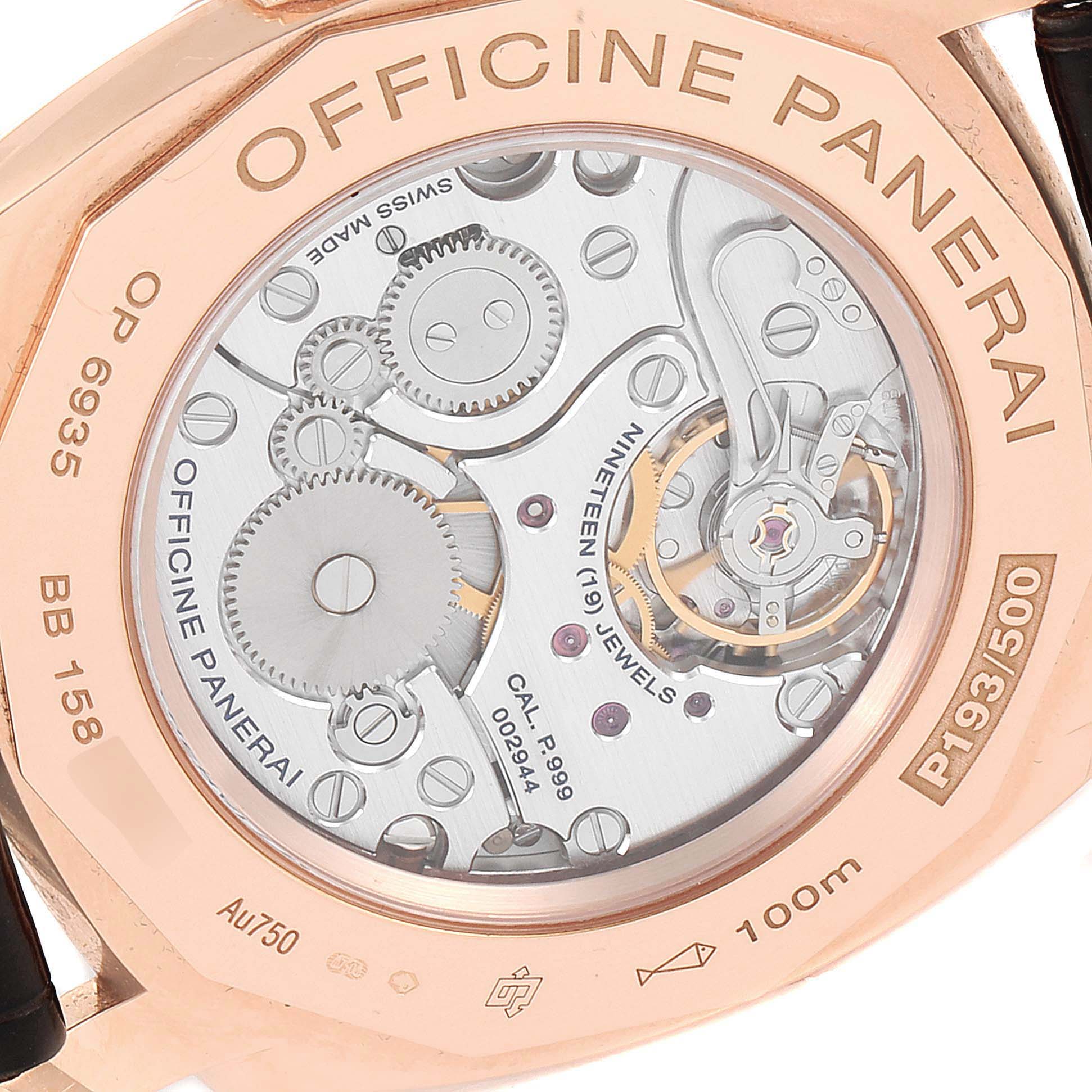 The image shows the back case of a Panerai Radiomir PAM00513 Men's Rose Gold Brown Dial PAM00513 Men's Rose Gold Brown Dial watch, showcasing its mechanical movements and gears.