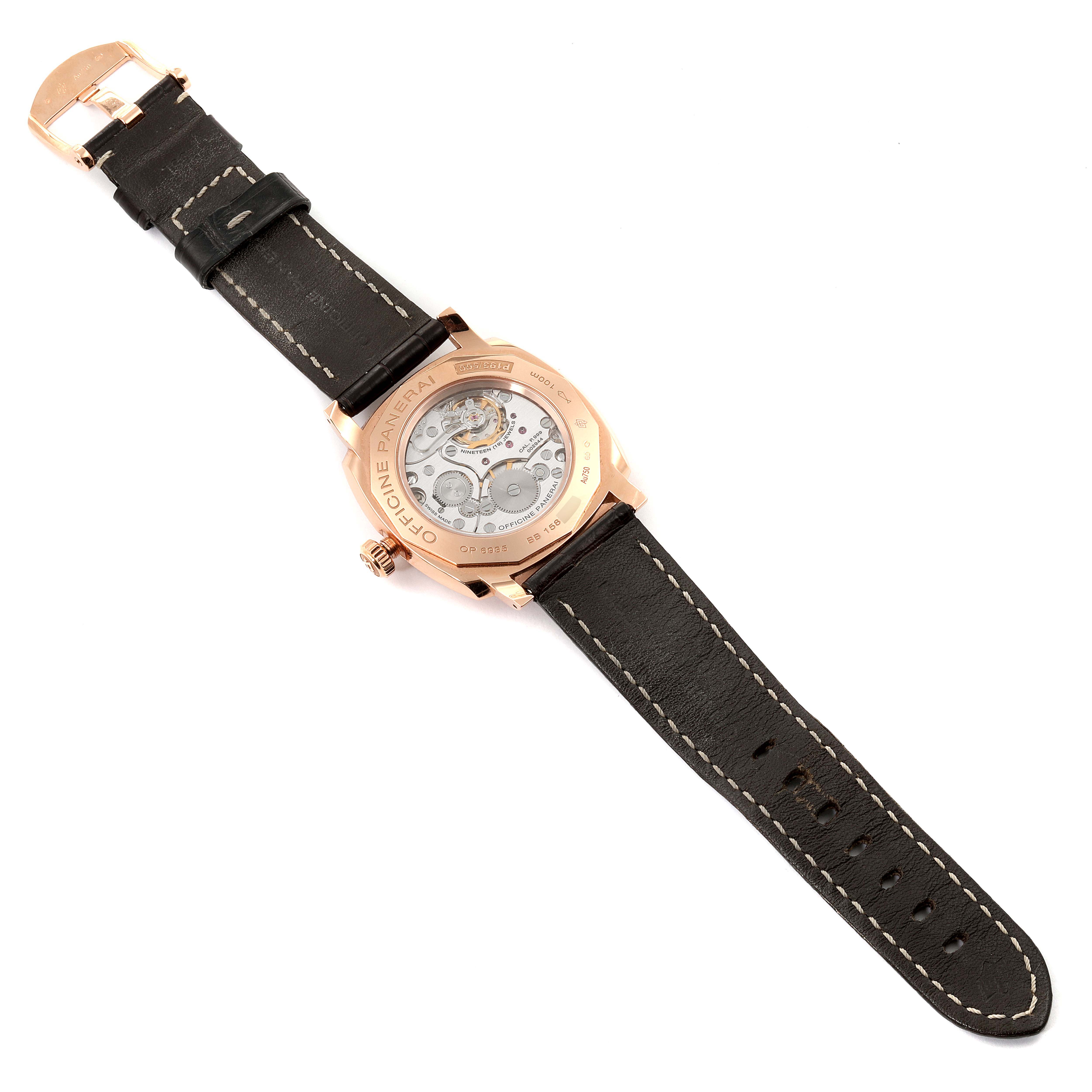 The image shows the back side of the Panerai Radiomir PAM00513 Men's Rose Gold Brown Dial PAM00513 Men's Rose Gold Brown Dial watch, showcasing its movement and leather strap.