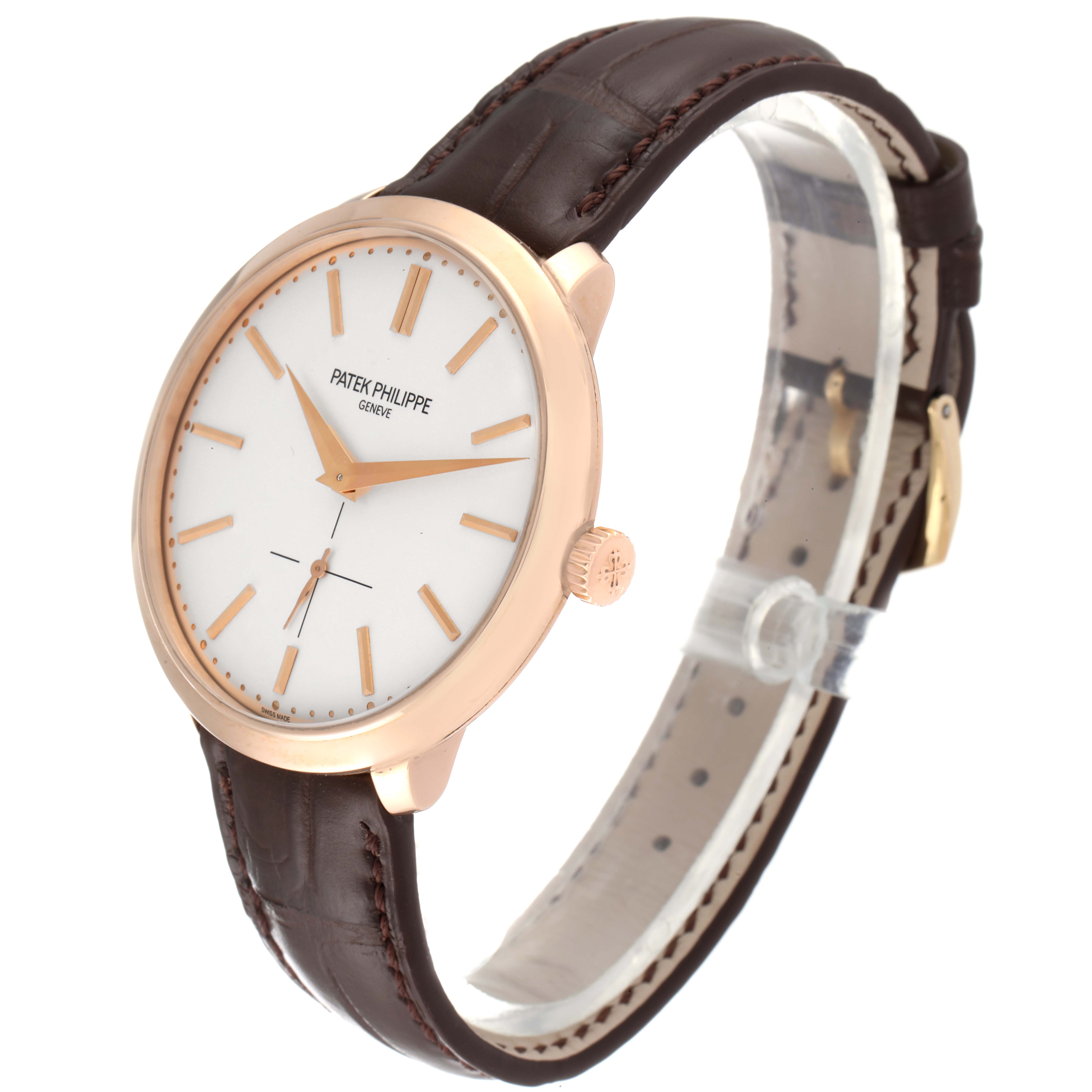 The watch is a Patek Philippe Calatrava 5123R-001 Men's Rose Gold Silver Dial 5123R-001 Men's Rose Gold Silver Dial model shown from a side angle, displaying its face, crown, and leather strap.