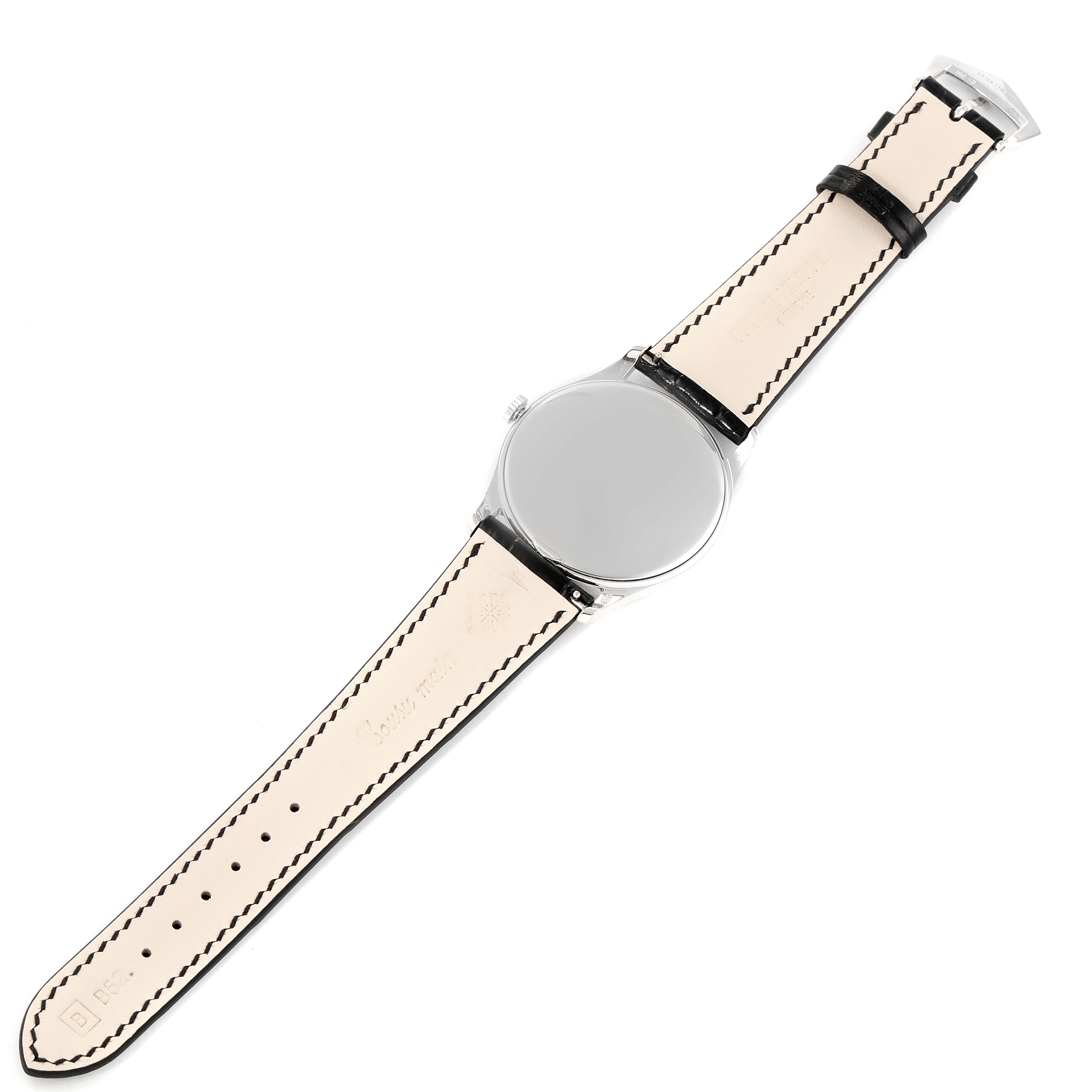 This image shows the backside of a Patek Philippe Calatrava 5196G Men's White Gold Silver Dial 5196G Men's White Gold Silver Dial watch, including the rear case and both leather straps.