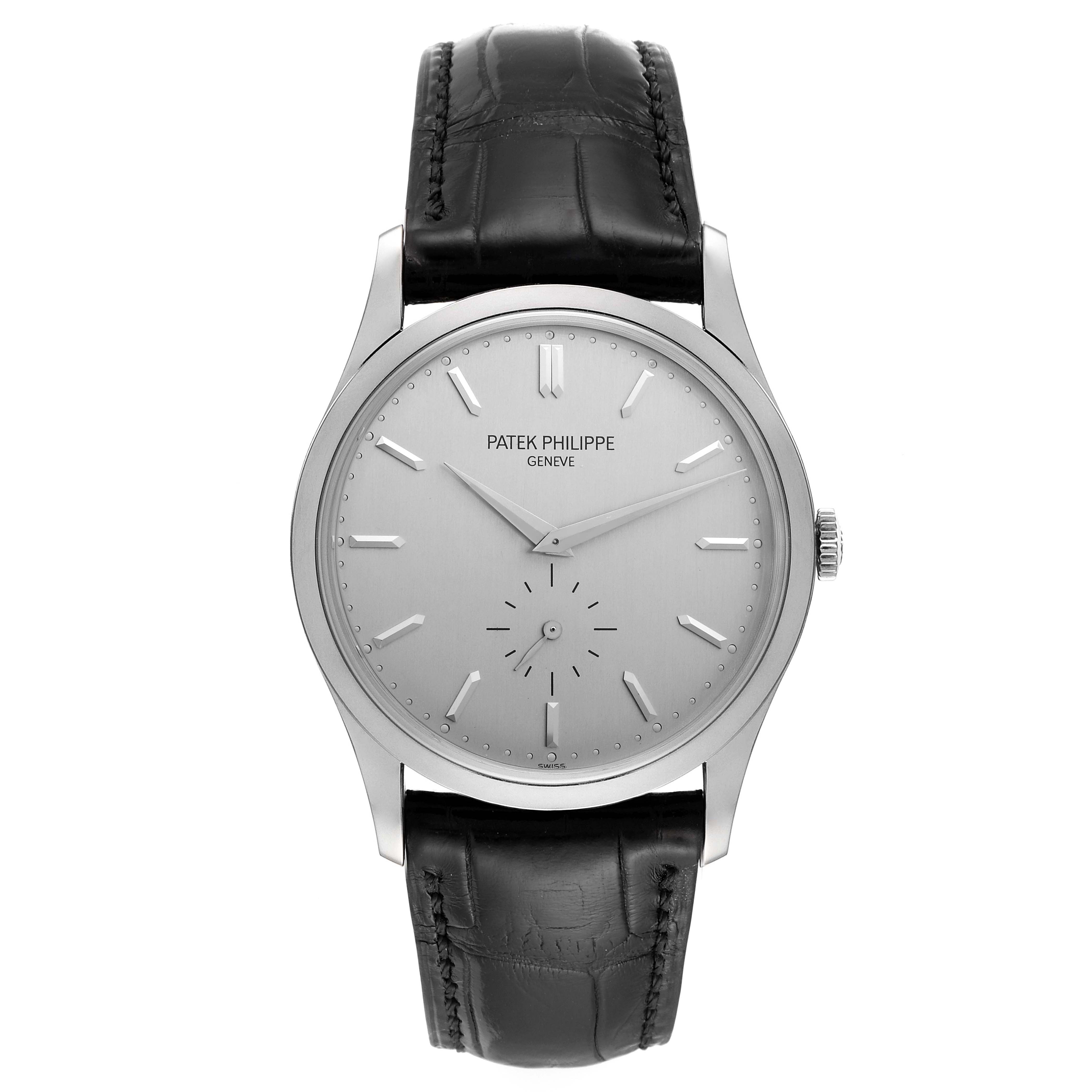 The image shows a front view of the Patek Philippe Calatrava 5196G Men's White Gold Silver Dial 5196G Men's White Gold Silver Dial watch, displaying its face, case, and black leather strap.