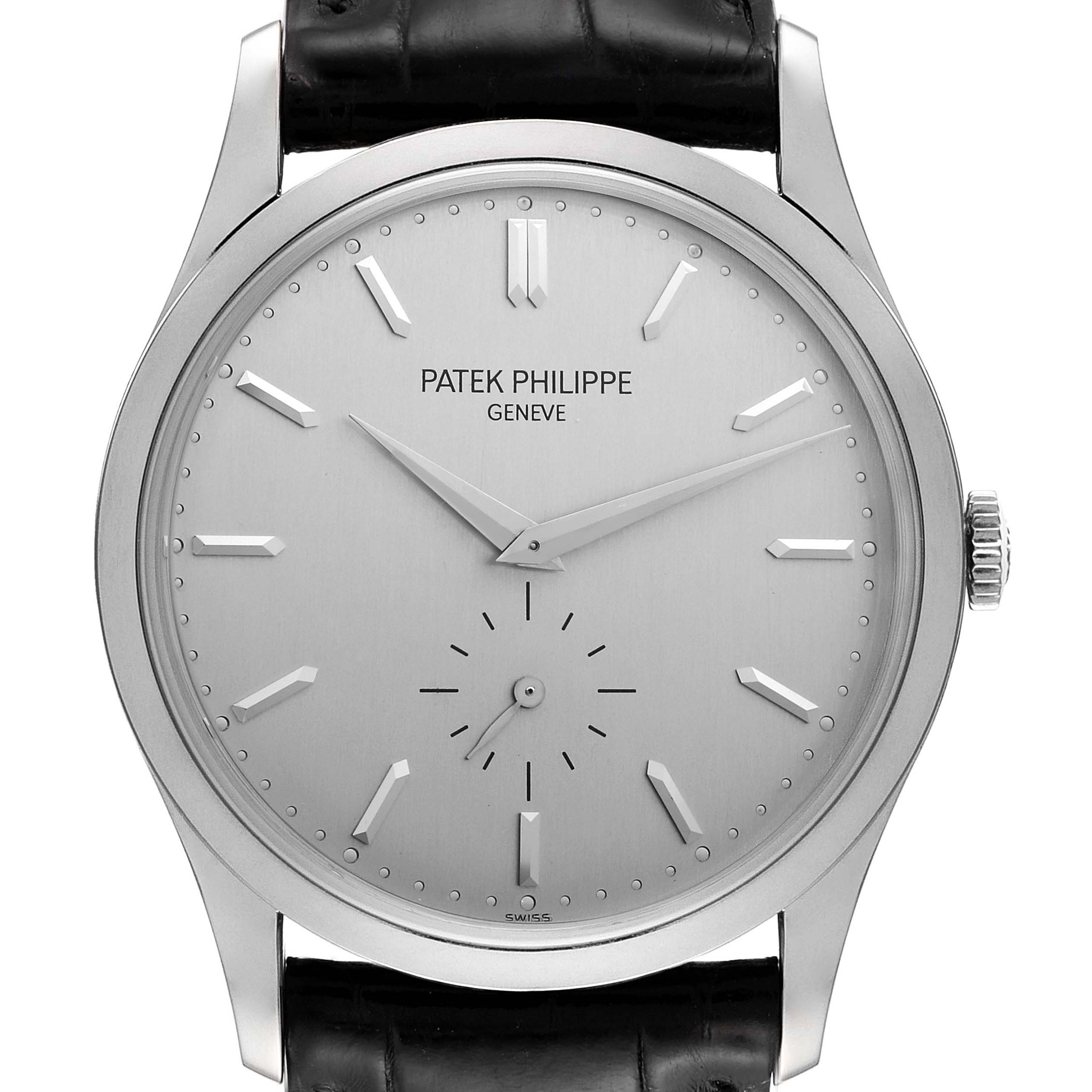 The image shows a frontal view of the Patek Philippe Calatrava 5196G Men's White Gold Silver Dial 5196G Men's White Gold Silver Dial watch, displaying its dial, hands, crown, and part of the strap.