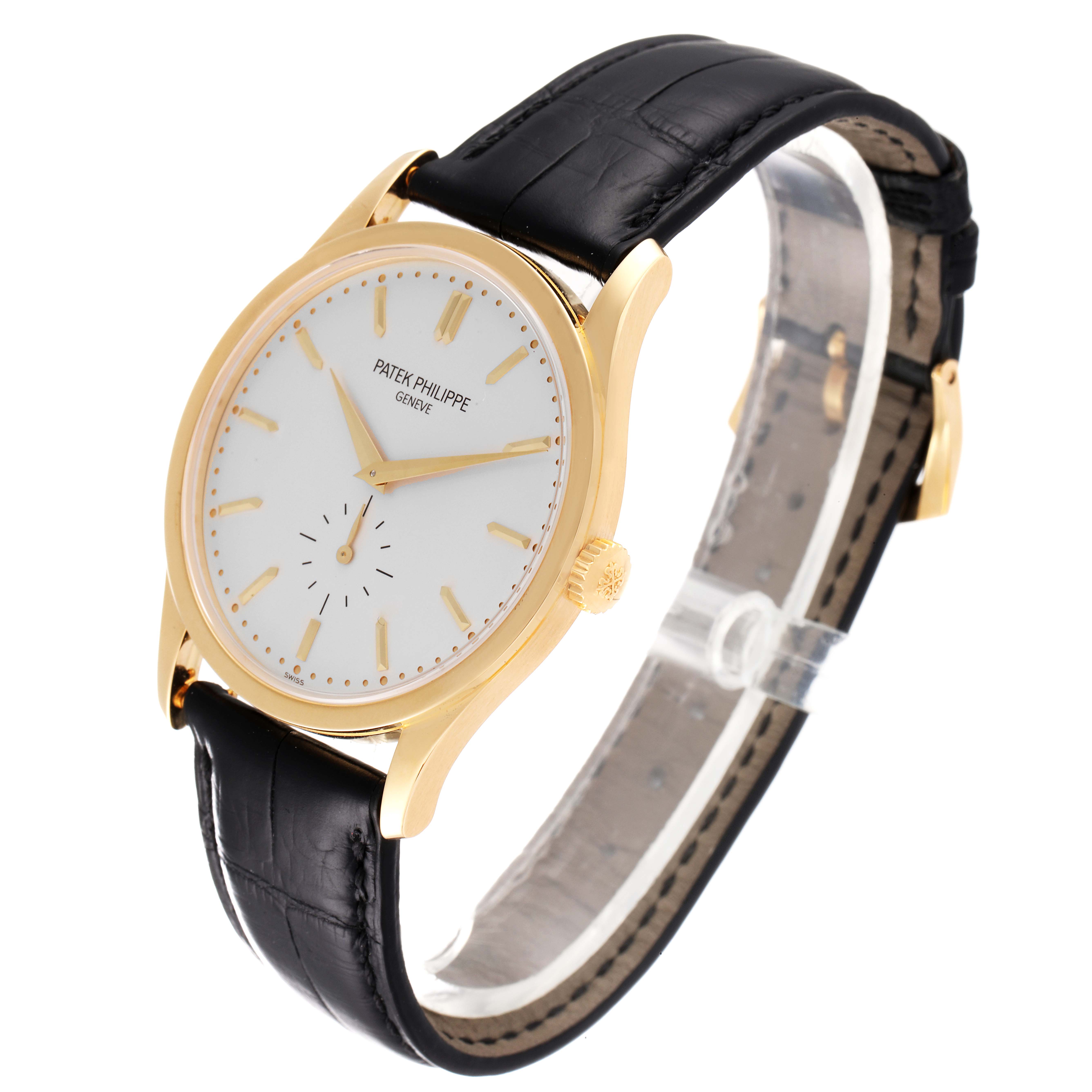 The image shows a Patek Philippe Calatrava 5196J Men's Yellow Gold Silver Dial 5196J Men's Yellow Gold Silver Dial watch at an angled view, highlighting its gold case, white dial, and black leather strap.