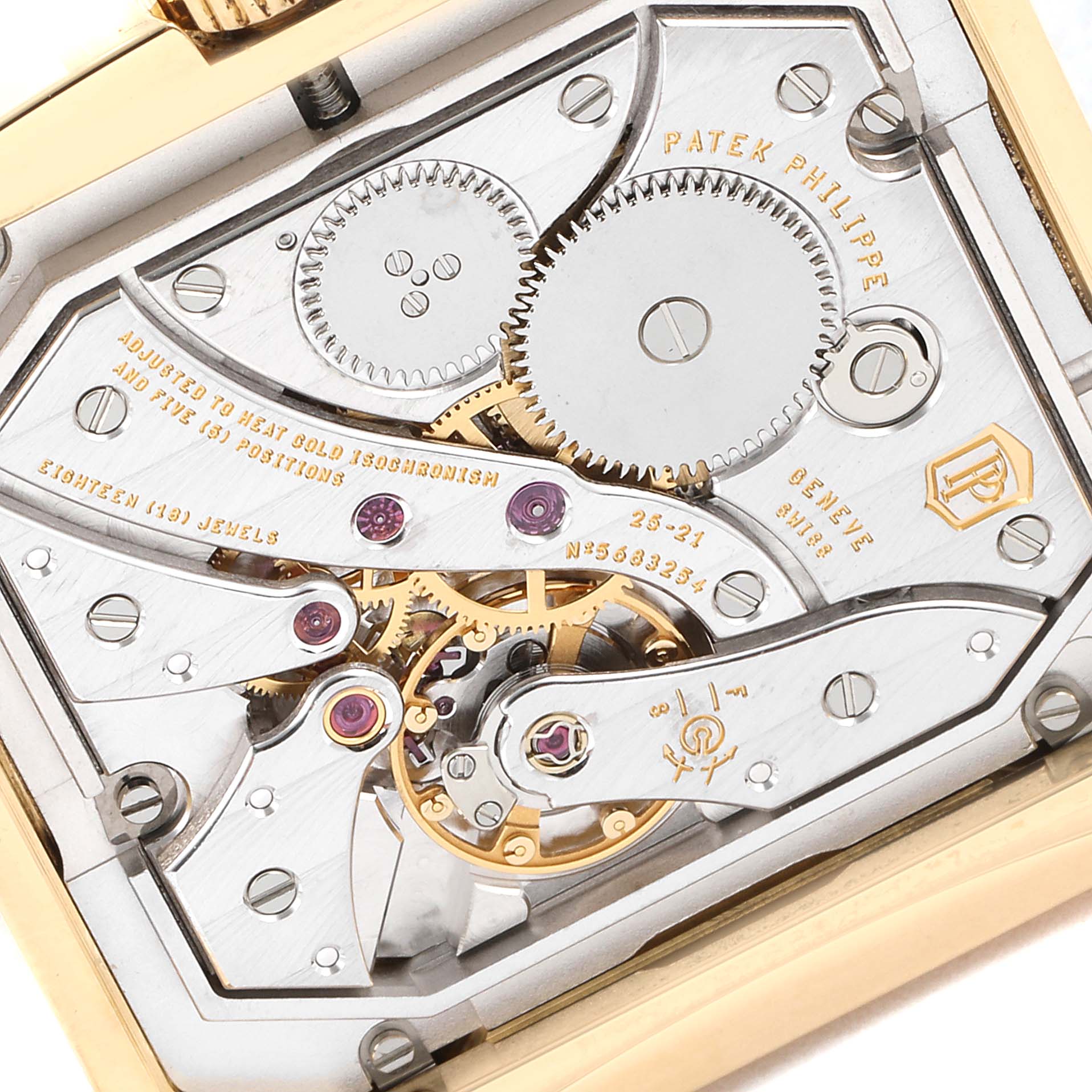 The image shows a close-up of the movement and inner workings of a Patek Philippe Gondolo 5124J Men's Yellow Gold Silver Dial 5124J Men's Yellow Gold Silver Dial watch.