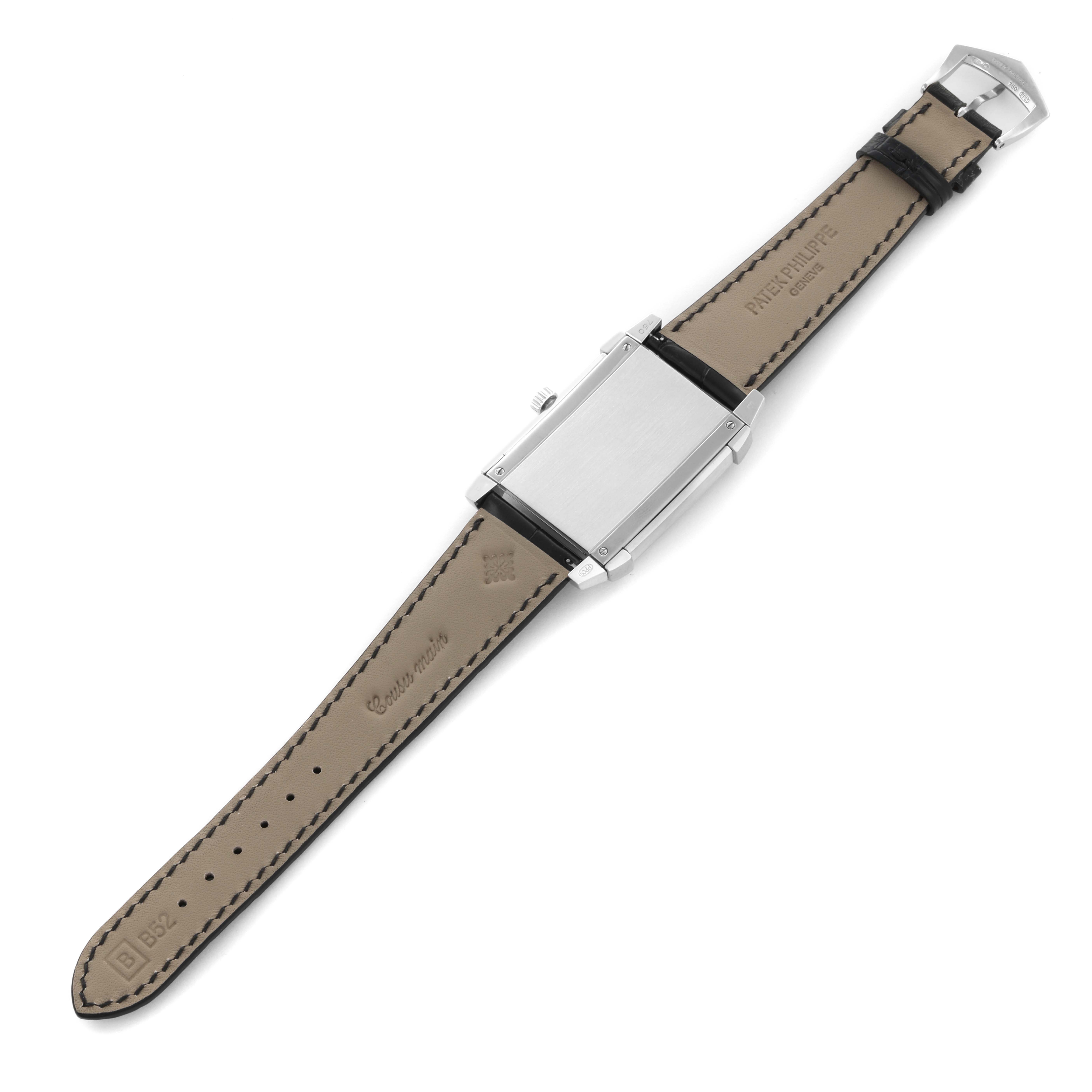 The image shows the back view of a Patek Philippe Gondolo 5111G-001 Men's White Gold Silver Dial 5111G-001 Men's White Gold Silver Dial watch, highlighting the case and leather strap.