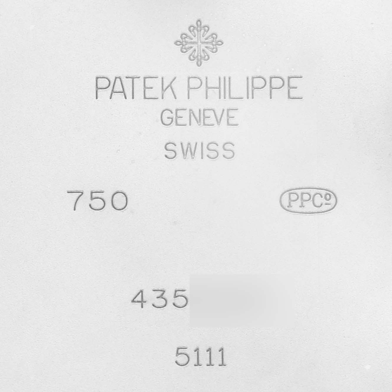 The image shows the engraved backplate of a Patek Philippe Gondolo 5111G-001 Men's White Gold Silver Dial 5111G-001 Men's White Gold Silver Dial watch, highlighting the brand and model details.