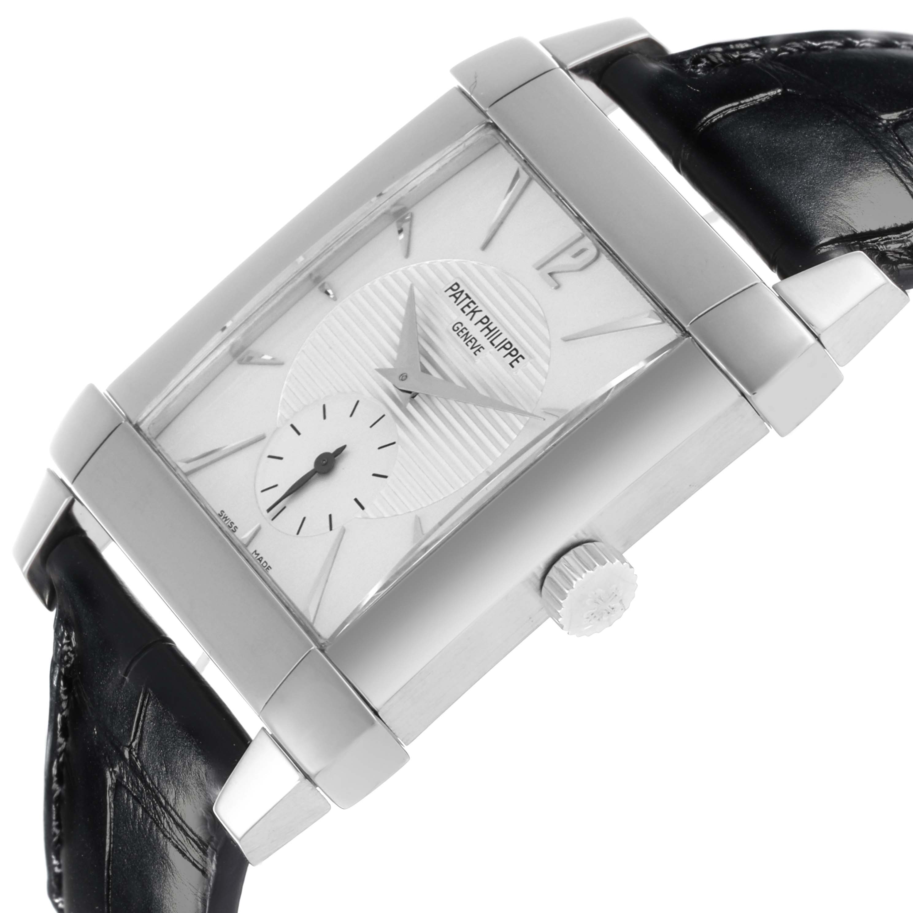 The Patek Philippe Gondolo 5111G-001 Men's White Gold Silver Dial 5111G-001 Men's White Gold Silver Dial watch is shown at an angle displaying its rectangular dial, crown, and part of the leather strap.