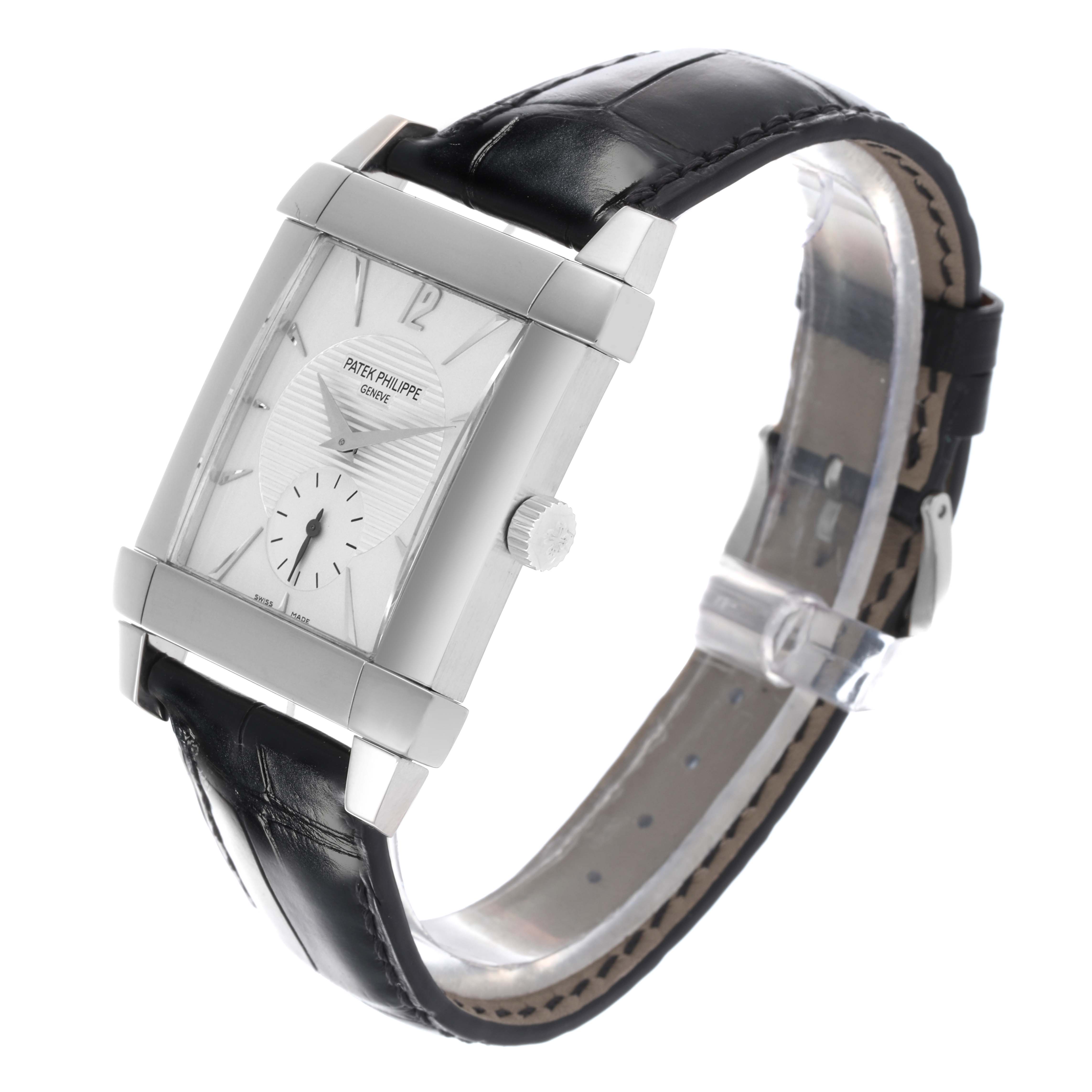 The Patek Philippe Gondolo 5111G-001 Men's White Gold Silver Dial 5111G-001 Men's White Gold Silver Dial watch is shown at a three-quarter angle, highlighting the case, dial, crown, and strap.
