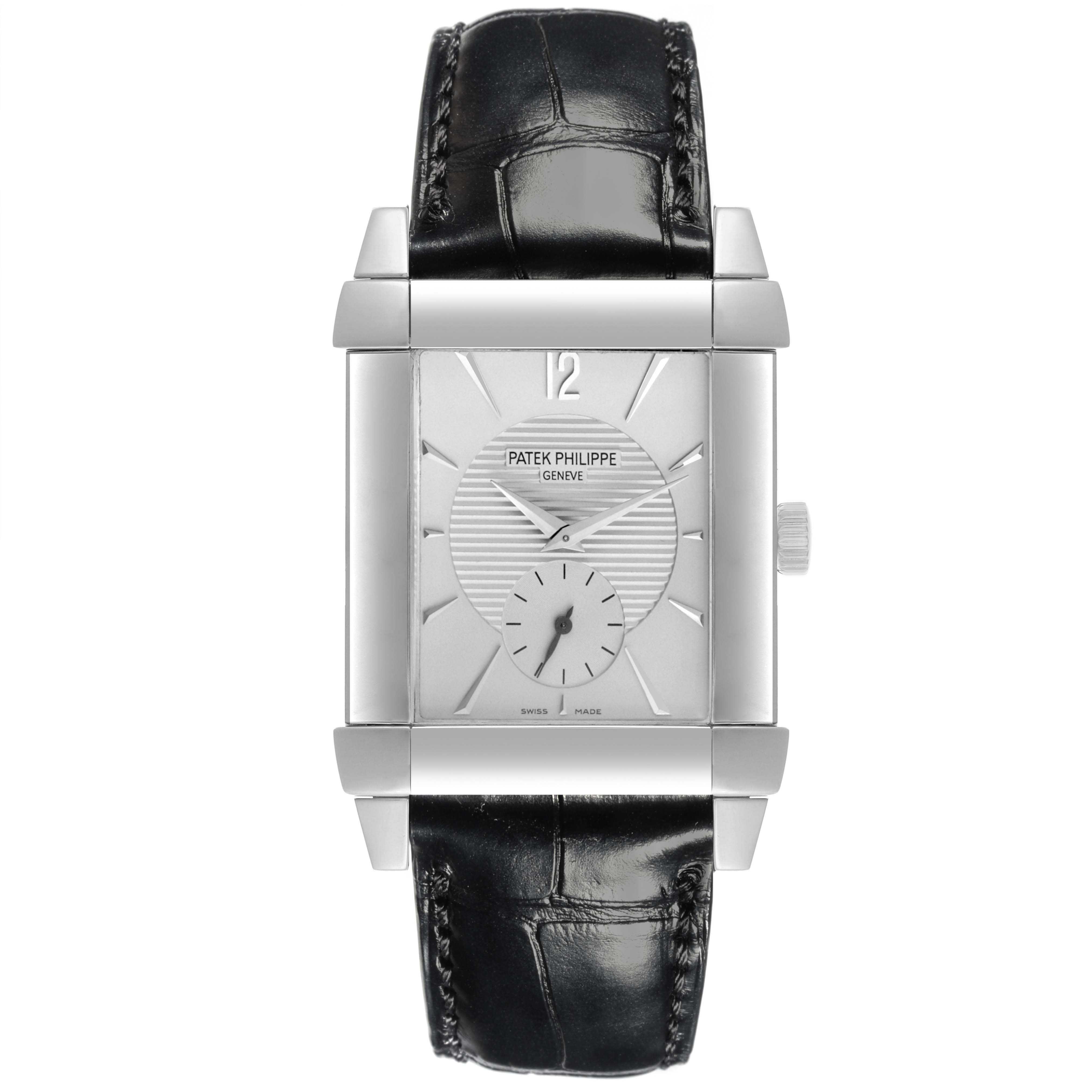 The Patek Philippe Gondolo 5111G-001 Men's White Gold Silver Dial 5111G-001 Men's White Gold Silver Dial watch is shown from the front, featuring its rectangular face, silver dial, and black leather strap.