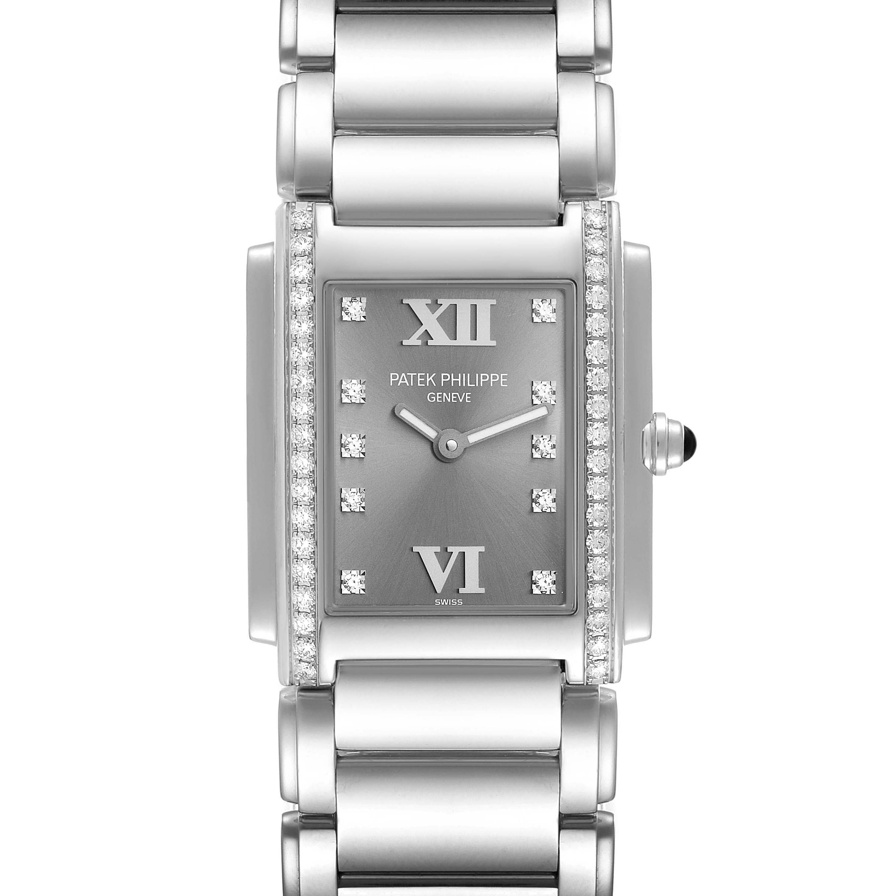 The image shows a frontal view of the Patek Philippe Twenty-4 4910 Women's Stainless Steel Grey Dial 4910 Women's Stainless Steel Grey Dial watch, highlighting its face, bezel, and bracelet.