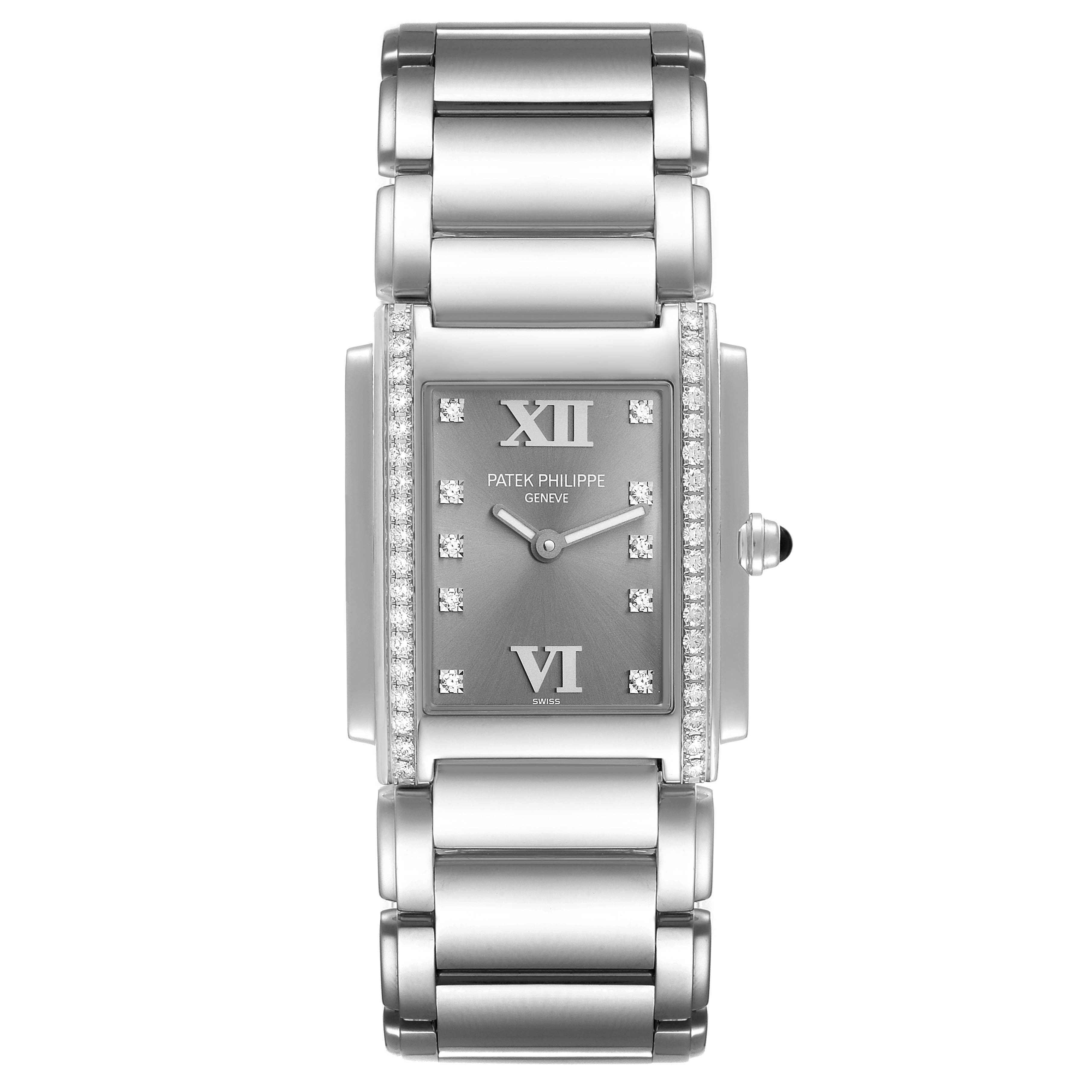 The image shows a front view of a Patek Philippe Twenty-4 4910 Women's Stainless Steel Grey Dial 4910 Women's Stainless Steel Grey Dial model watch, highlighting its rectangular face, bracelet, and diamond details.