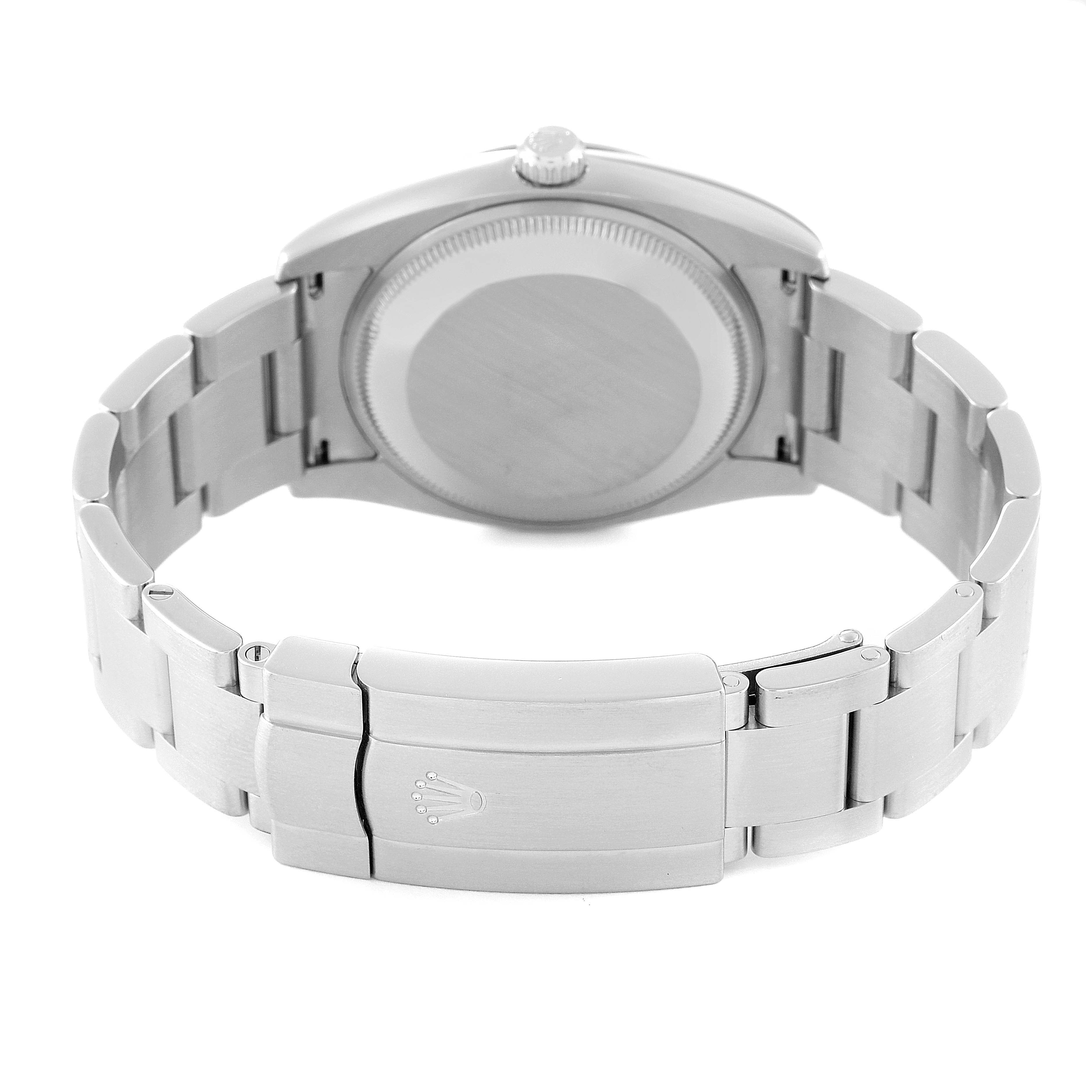 The image shows the back case and bracelet clasp of a Rolex Oyster Perpetual 114200 Men's Stainless Steel Silver Dial 114200 Men's Stainless Steel Silver Dial watch from a rear angle.