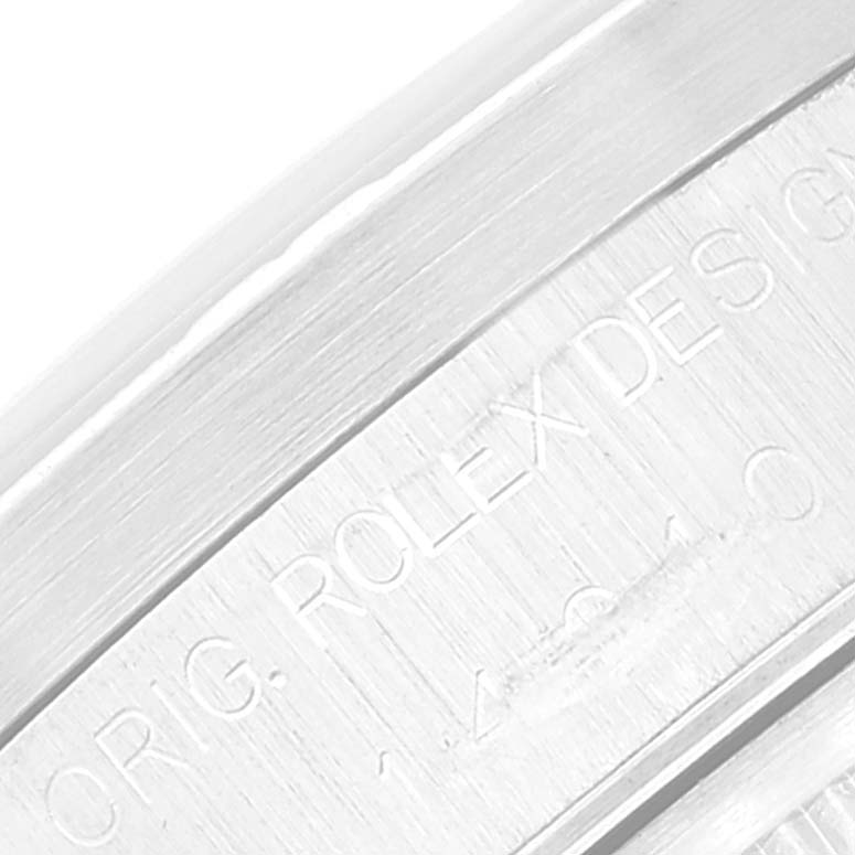 Close-up of the engraving on the bezel of a Rolex Air-King 14010 Men's Stainless Steel Silver Dial 14010 Men's Stainless Steel Silver Dial watch.