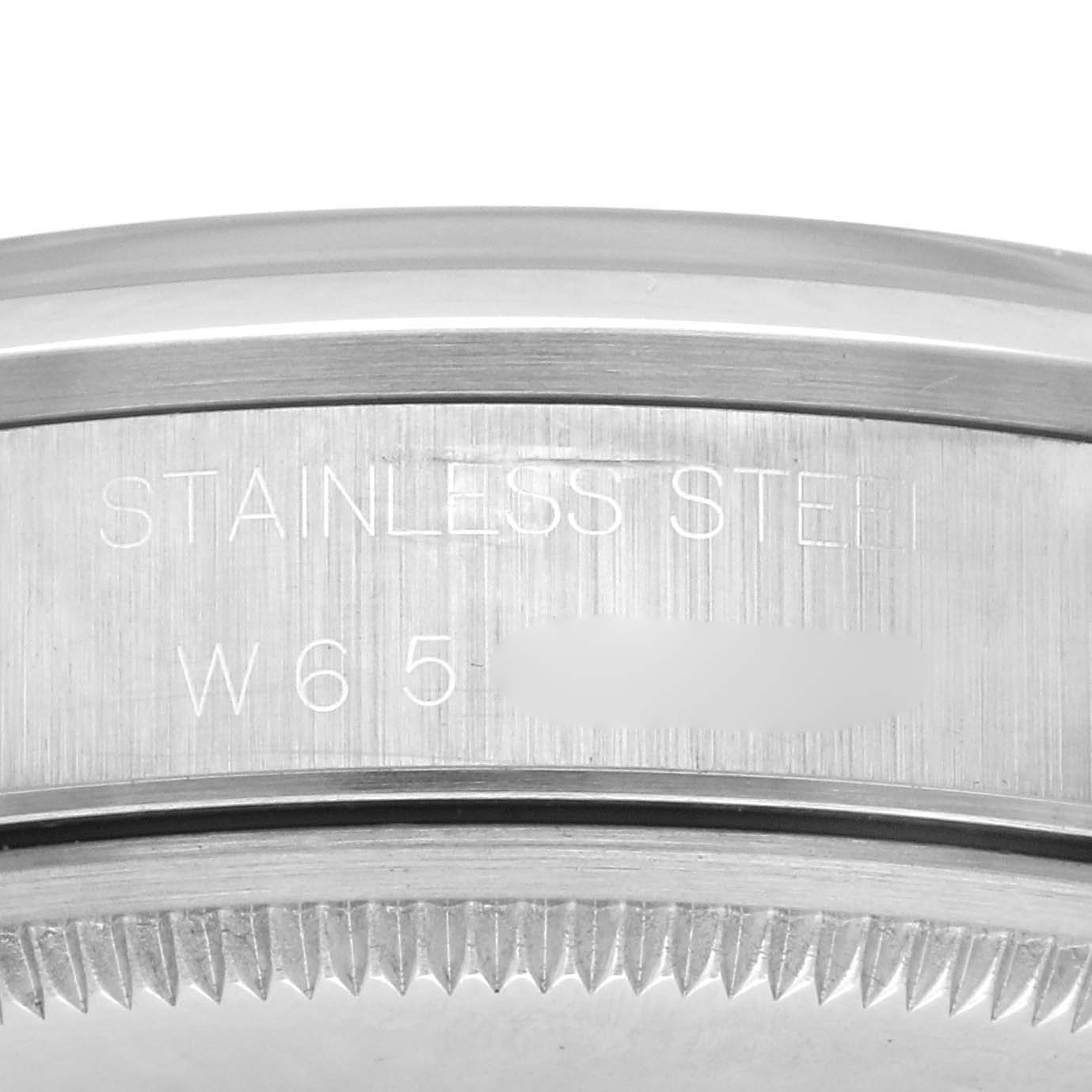 The image shows a close-up of the case side of a Rolex Air-King 14000 Men's Stainless Steel White Dial 14000 Men's Stainless Steel White Dial watch, highlighting the stainless steel engraving.