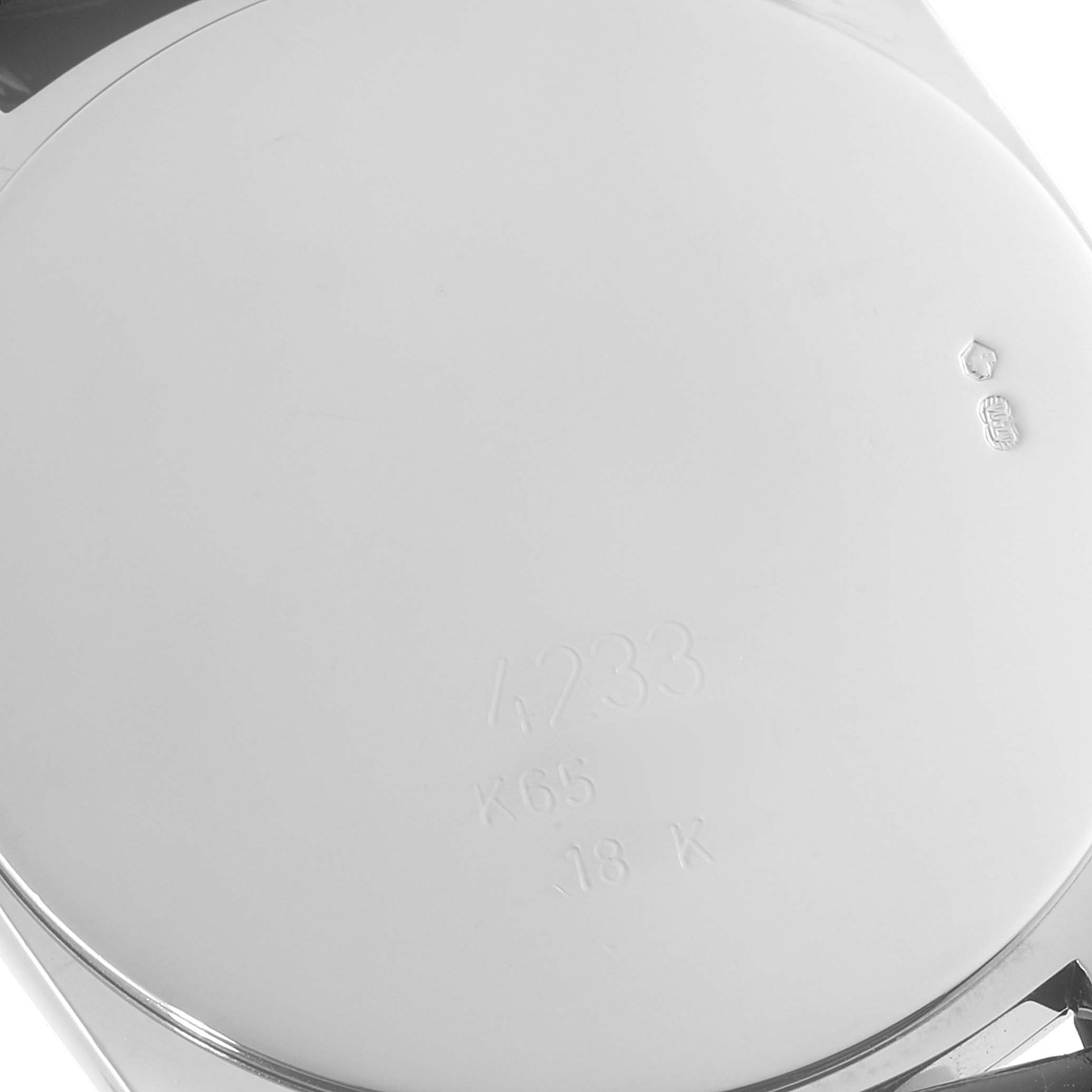 This image shows the case back of a Rolex Cellini 4233 Men's White Gold Black Dial 4233 Men's White Gold Black Dial watch, highlighting the engraved model number and gold purity marks.