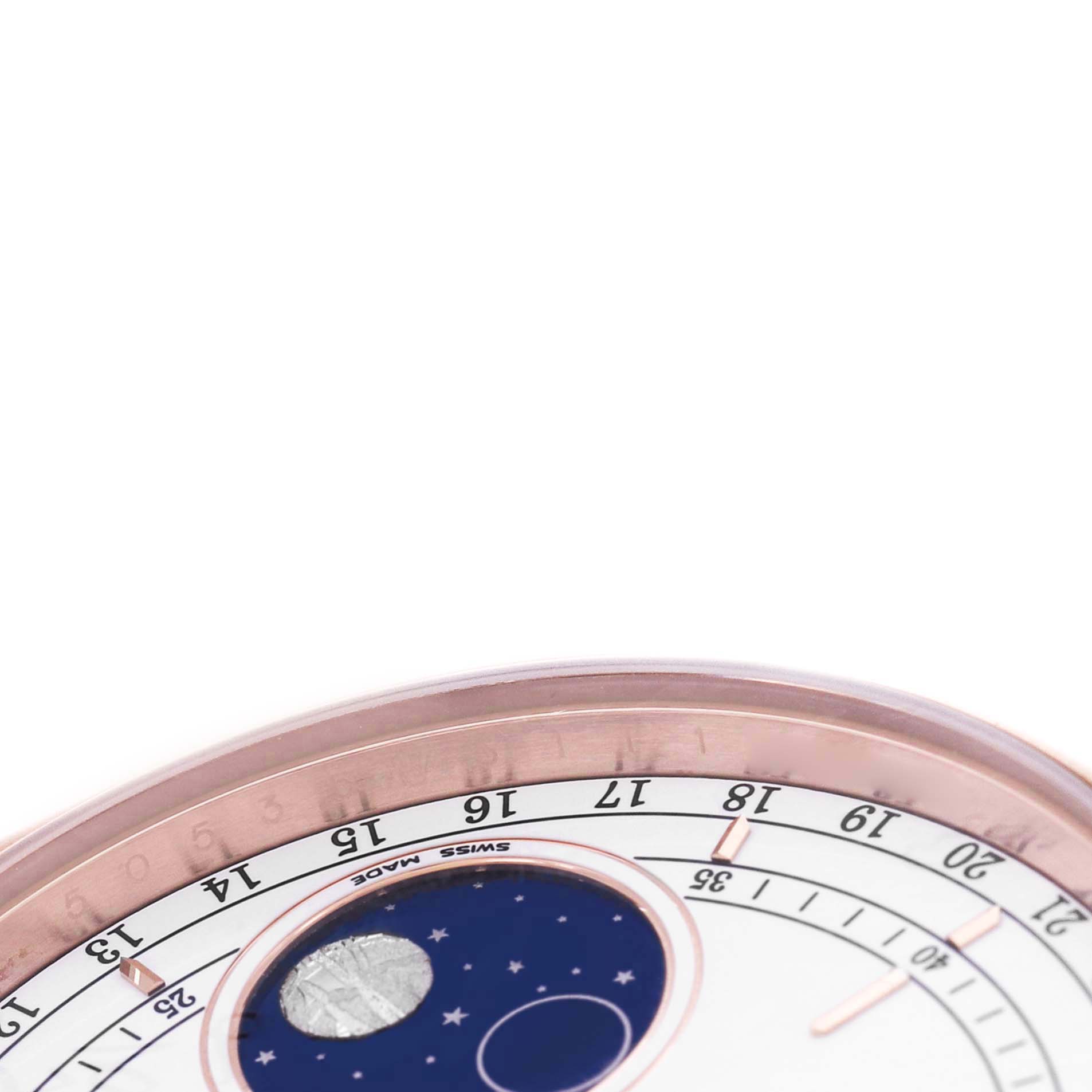 The image shows a close-up of the dial of a Rolex Cellini 50535 Men's Rose Gold White Dial, highlighting the moon phase feature and part of the chapter ring.