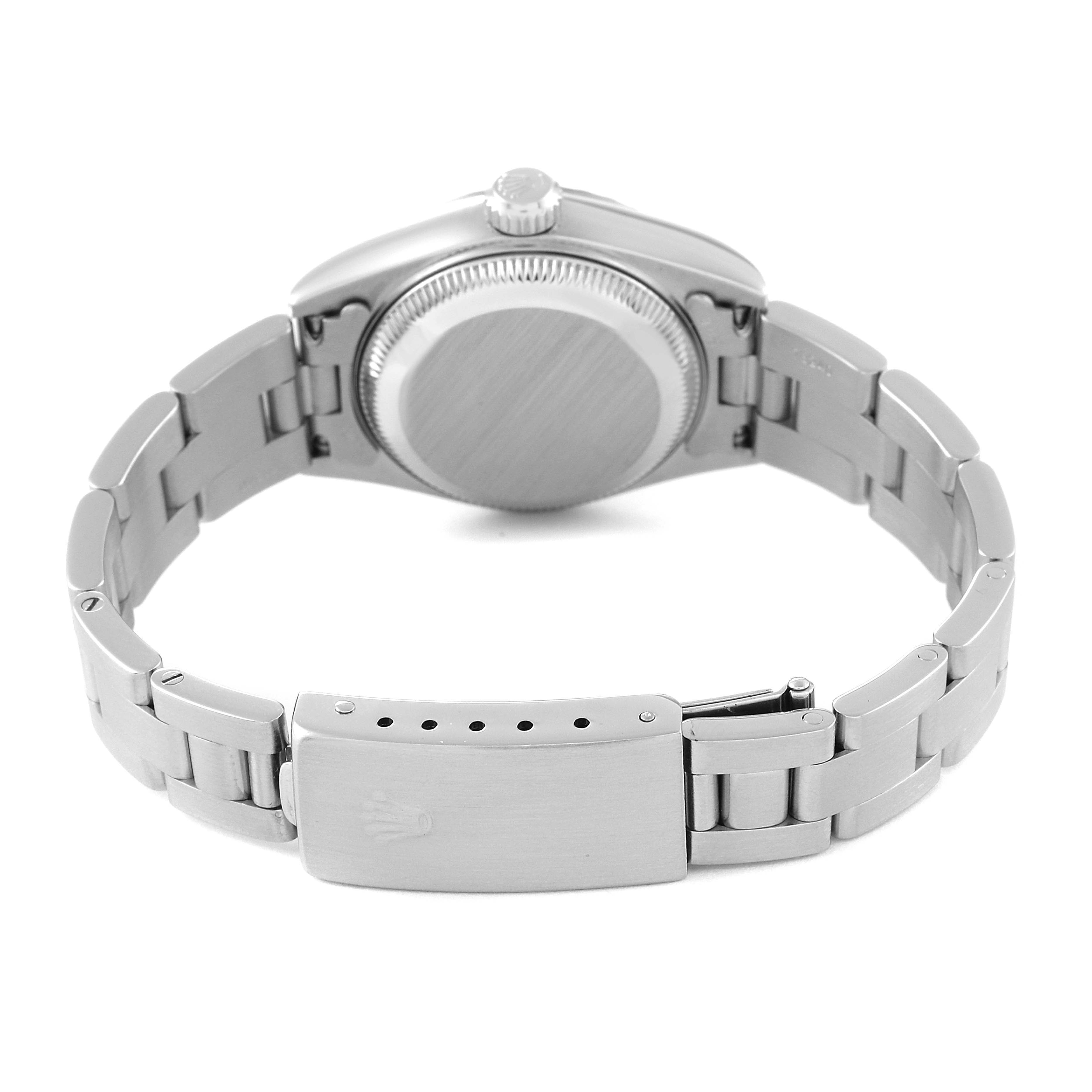 The image shows the back view of a Rolex Date 79240 Women's Stainless Steel Pink Dial 79240 Women's Stainless Steel Pink Dial model watch, featuring its case back and clasp.