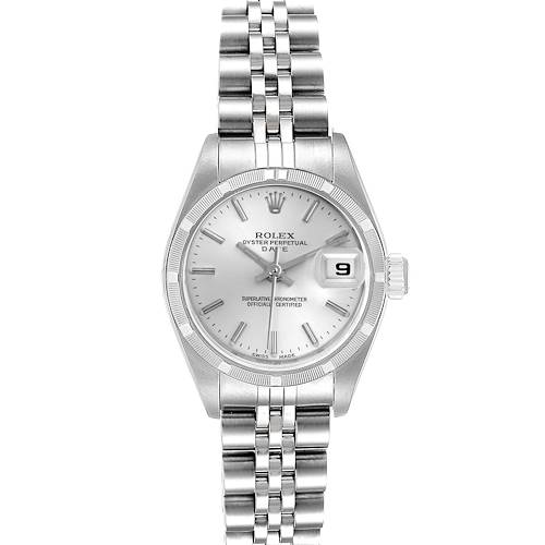 The Rolex Date model is shown from a top-down angle, displaying the dial, bracelet, crown, and date window.