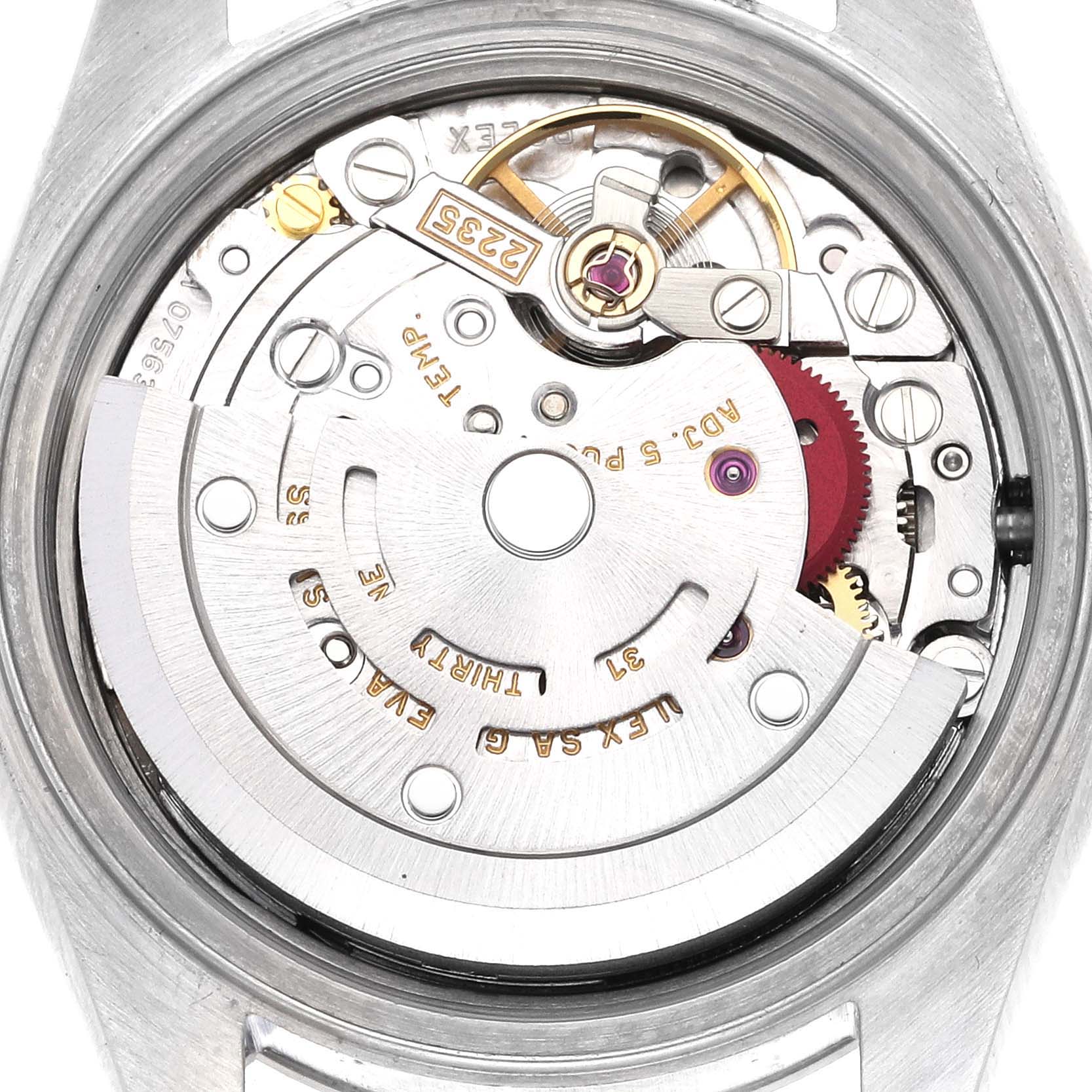 The image shows the movement of a Rolex Date 79190 Women
s Stainless Steel Silver Dial 79190 Women
s Stainless Steel Silver Dial model watch from a top-down angle, highlighting gearing and components.
