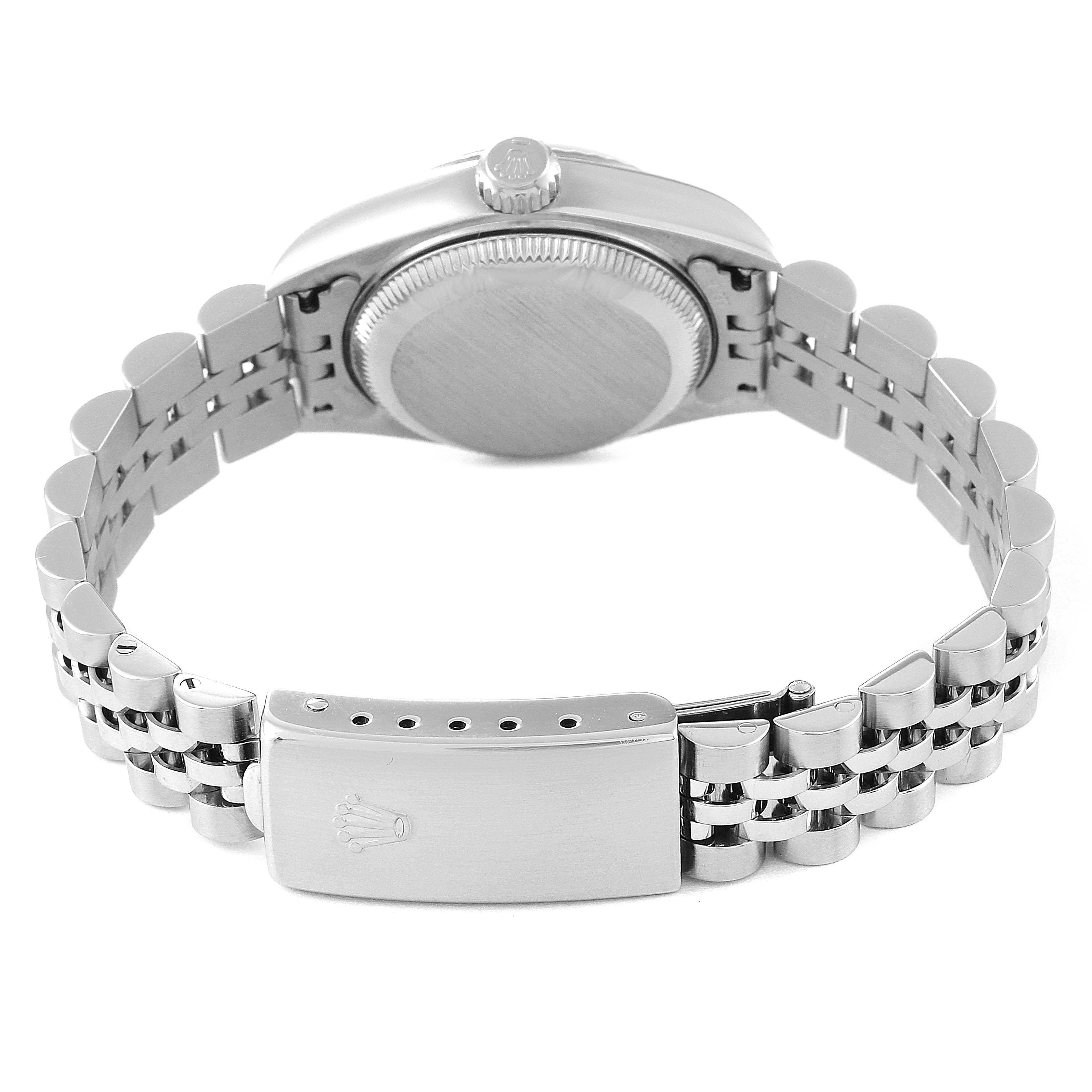 This image shows the back view of a Rolex Datejust 79174 Women's Stainless Steel White Dial 79174 Women's Stainless Steel White Dial watch, highlighting its case back and Jubilee bracelet with a clasp.