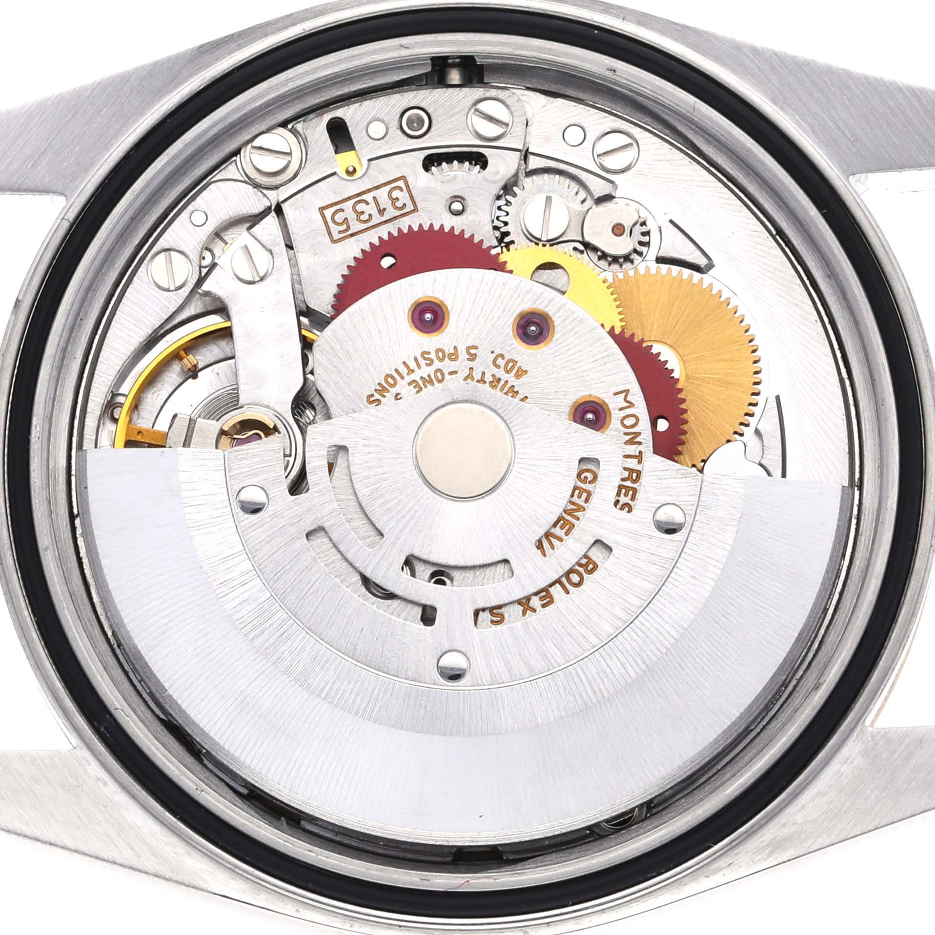 The image shows a close-up of the movement inside a Rolex Datejust 16233 Men's Steel and Gold (two tone) Champagne Dial 16233 Men's Steel and Gold (two tone) Champagne Dial, highlighting gears and the rotor.