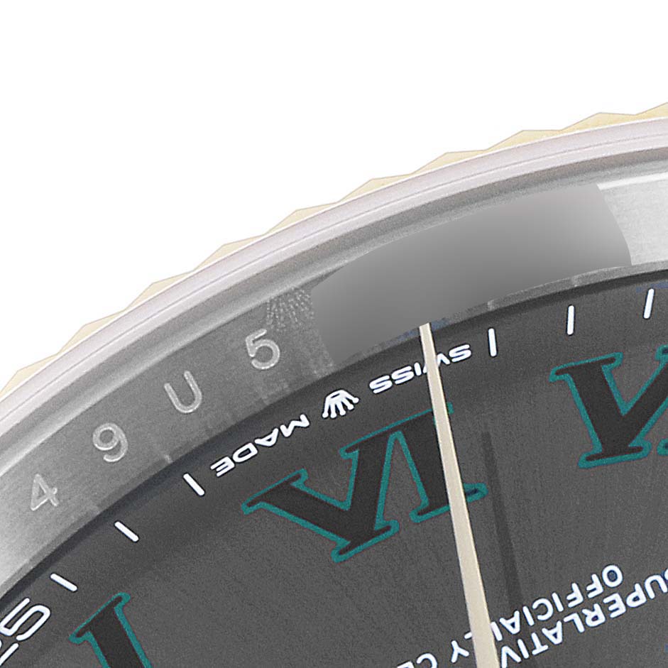 The image shows a close-up of the dial and part of the bezel of a Rolex Datejust 41 126333 Men's Steel and Gold (two tone) Grey Dial 126333 Men's Steel and Gold (two tone) Grey Dial, highlighting the "Swiss Made" text and Roman numeral markers.