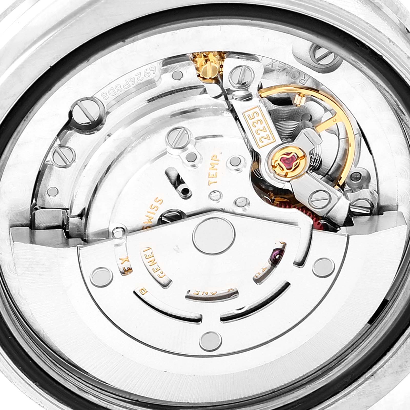 This is an upward close-up view of the Rolex Mid-Size 178384 Women's Stainless Steel Black Dial 178384 Women's Stainless Steel Black Dial model showing the internal movement mechanism.