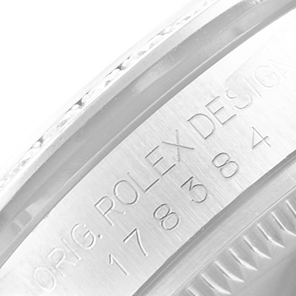 The image shows a close-up view of the engraved case side of a mid-size Rolex watch.