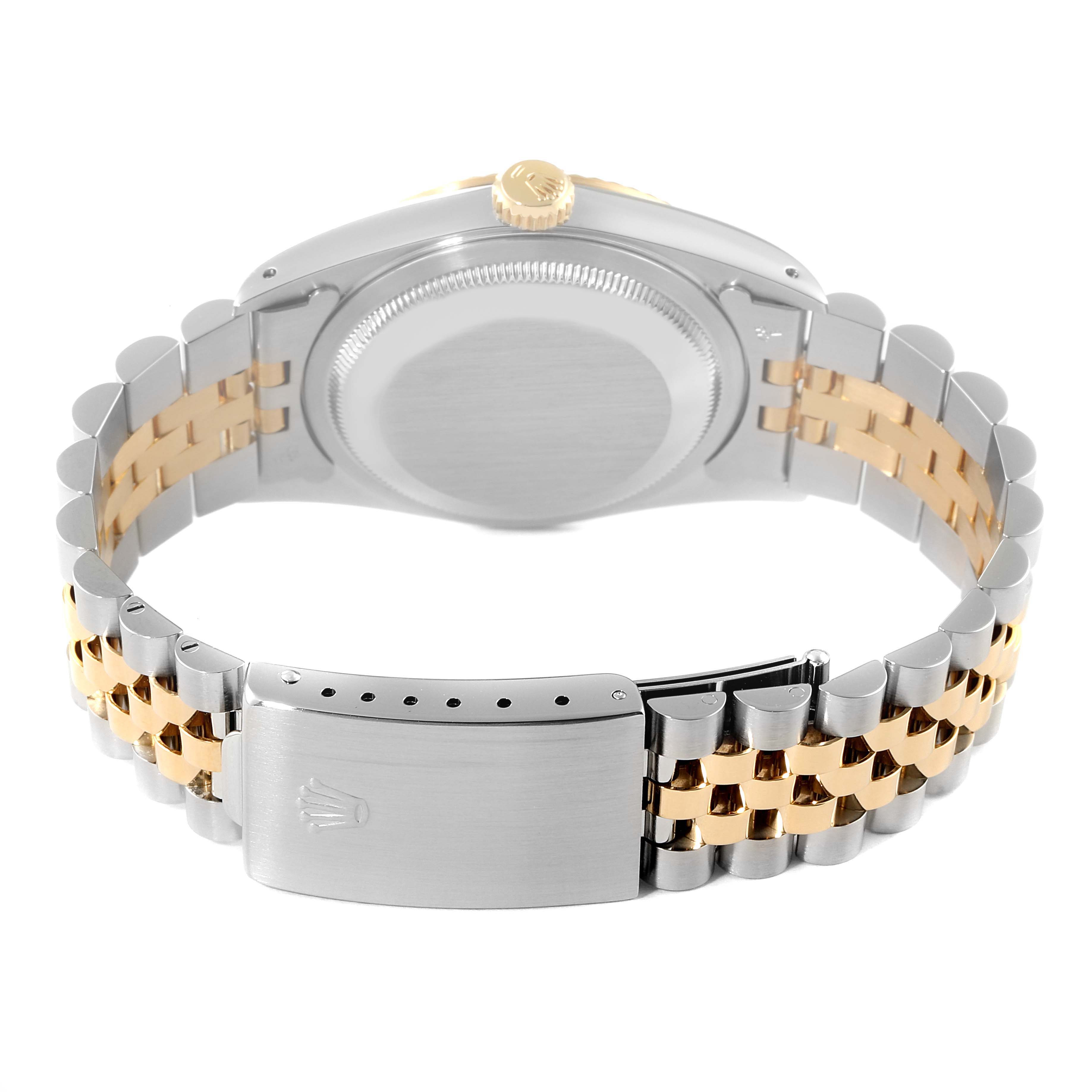 The image shows the back of a Rolex Datejust 16233 Men's Steel and Gold (two tone) White Dial 16233 Men's Steel and Gold (two tone) White Dial watch, highlighting the bracelet and clasp.