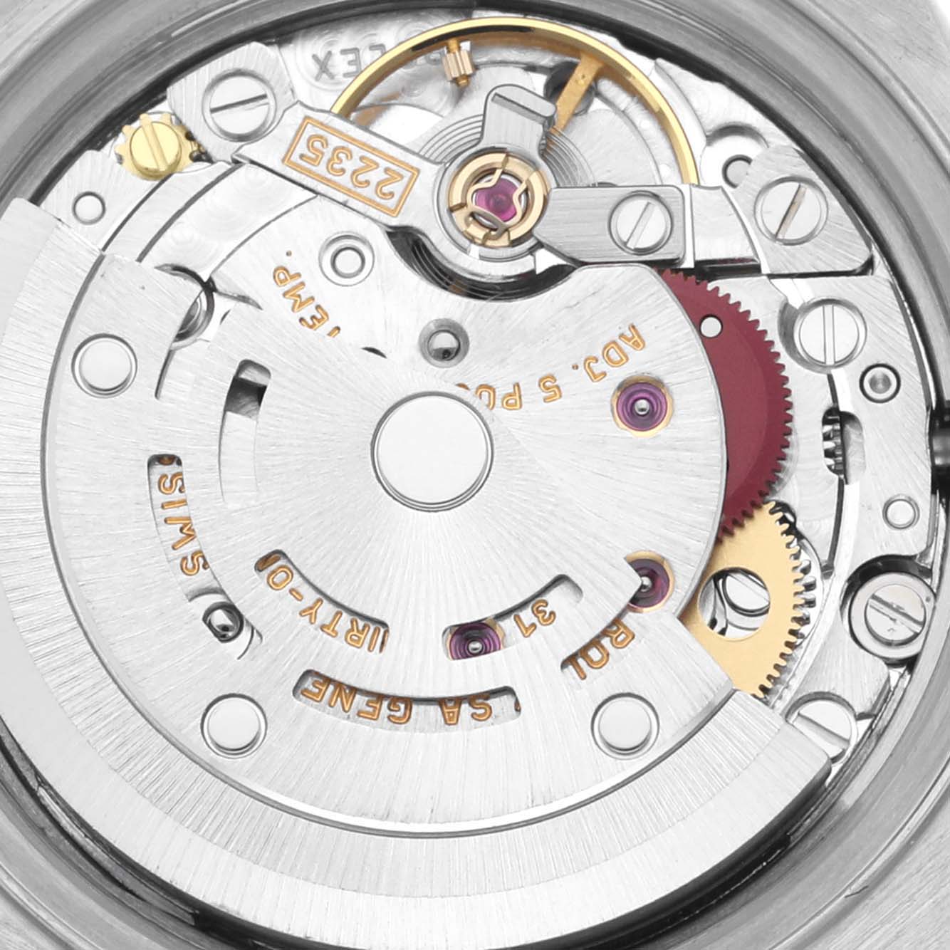 The image shows the movement of a Rolex Datejust 79174 Women's Stainless Steel Silver Dial 79174 Women's Stainless Steel Silver Dial watch from a top-down angle, highlighting gears and jewels.