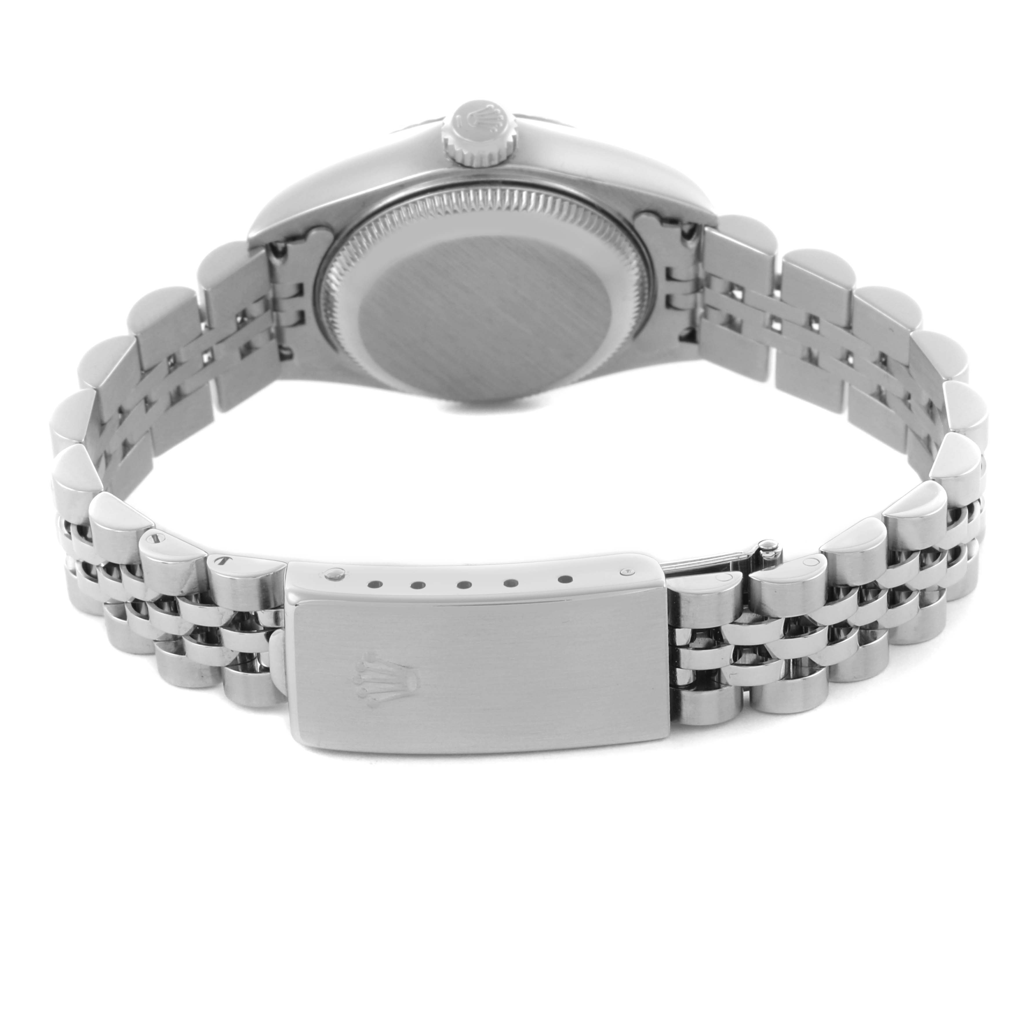 The image shows the Rolex Datejust 79174 Women's Stainless Steel Silver Dial 79174 Women's Stainless Steel Silver Dial watch from the back, highlighting the case back, crown, and Jubilee bracelet with the clasp.