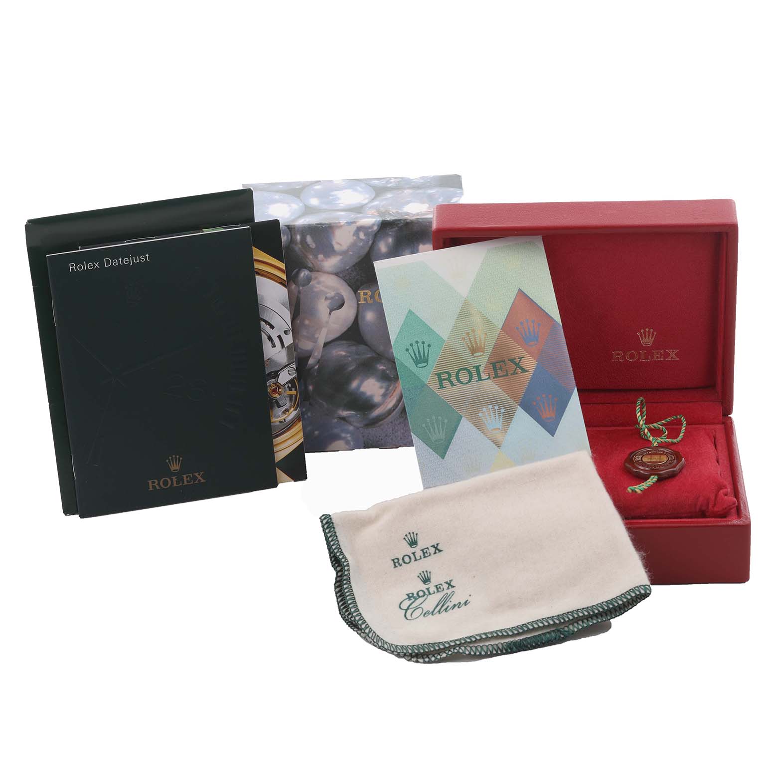The image shows Rolex Datejust 79174 Women's Stainless Steel Silver Dial 79174 Women's Stainless Steel Silver Dial accessories, including manuals, a box, tags, and a polishing cloth, displayed from the front.