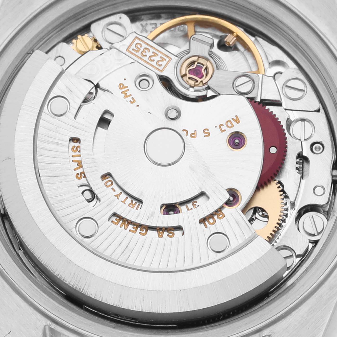 The image shows the movement mechanism of a Rolex Datejust 79174 Women's Stainless Steel Silver Dial 79174 Women's Stainless Steel Silver Dial, focusing on the rotor and internal gears.