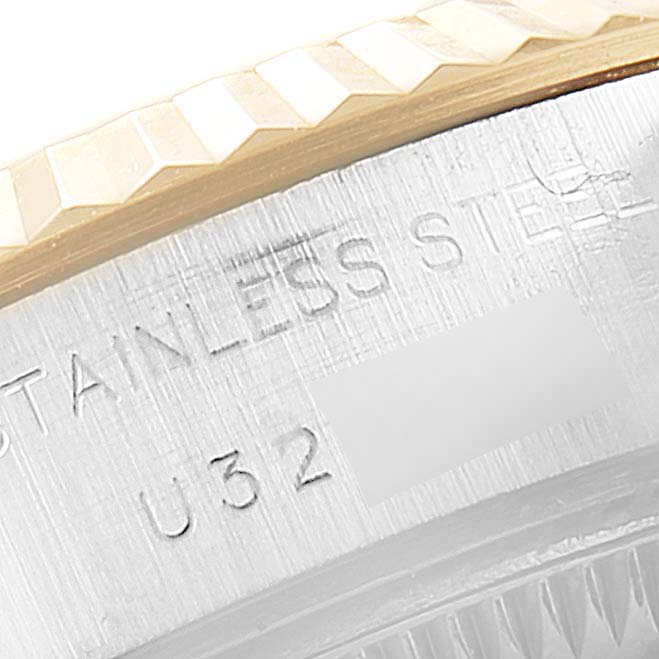 This image shows a close-up of the bezel and case side engraving of a Rolex Datejust 69173 Women
s Stainless Steel Silver Dial 69173 Women
s Stainless Steel Silver Dial watch.