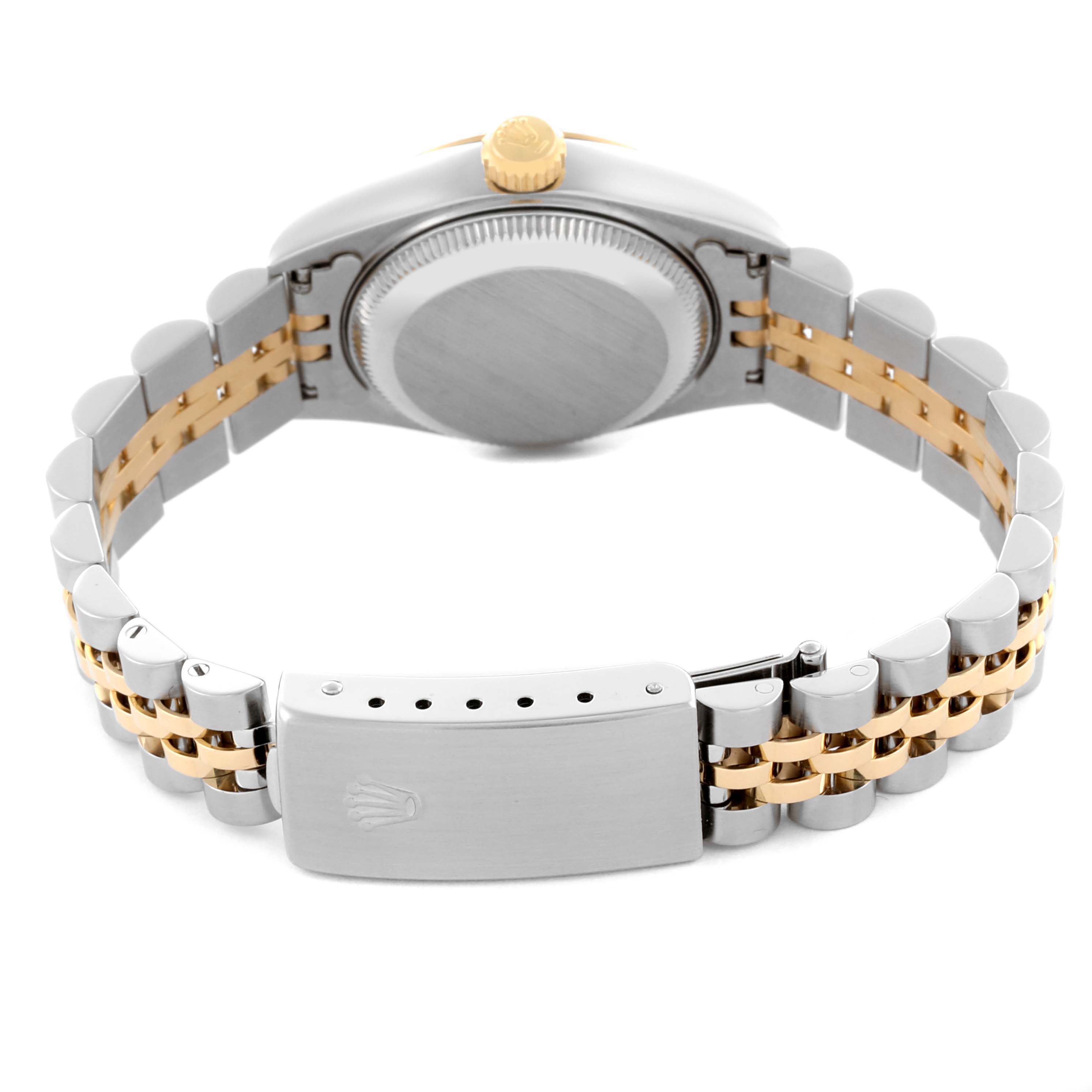 The image shows the back of a Rolex Datejust 69173 Women's Steel and Gold (two tone) Champagne Dial 69173 Women's Steel and Gold (two tone) Champagne Dial, highlighting the case, crown, and two-tone bracelet with the clasp visible.
