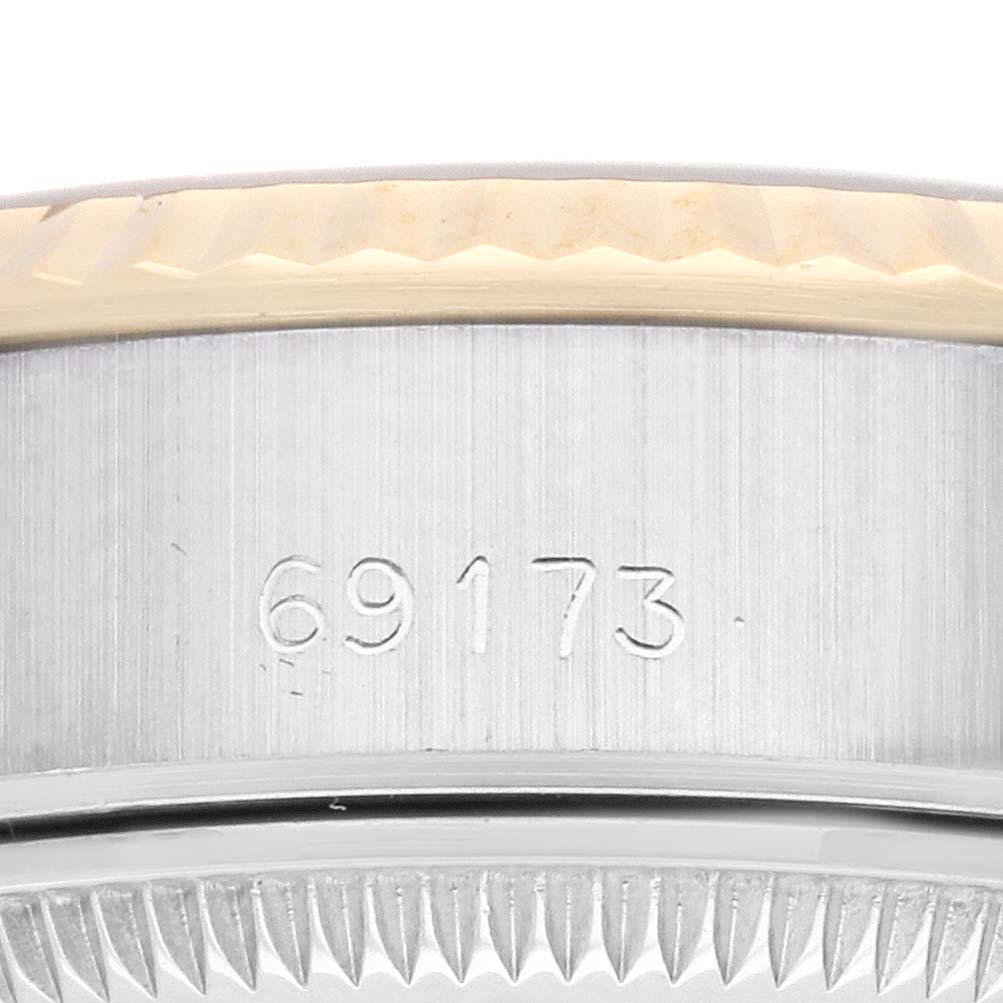 The image shows an angled close-up of a Rolex Datejust 69173 Women's Steel and Gold (two tone) Champagne Dial 69173 Women's Steel and Gold (two tone) Champagne Dial bezel and case side, featuring the model number 69173.