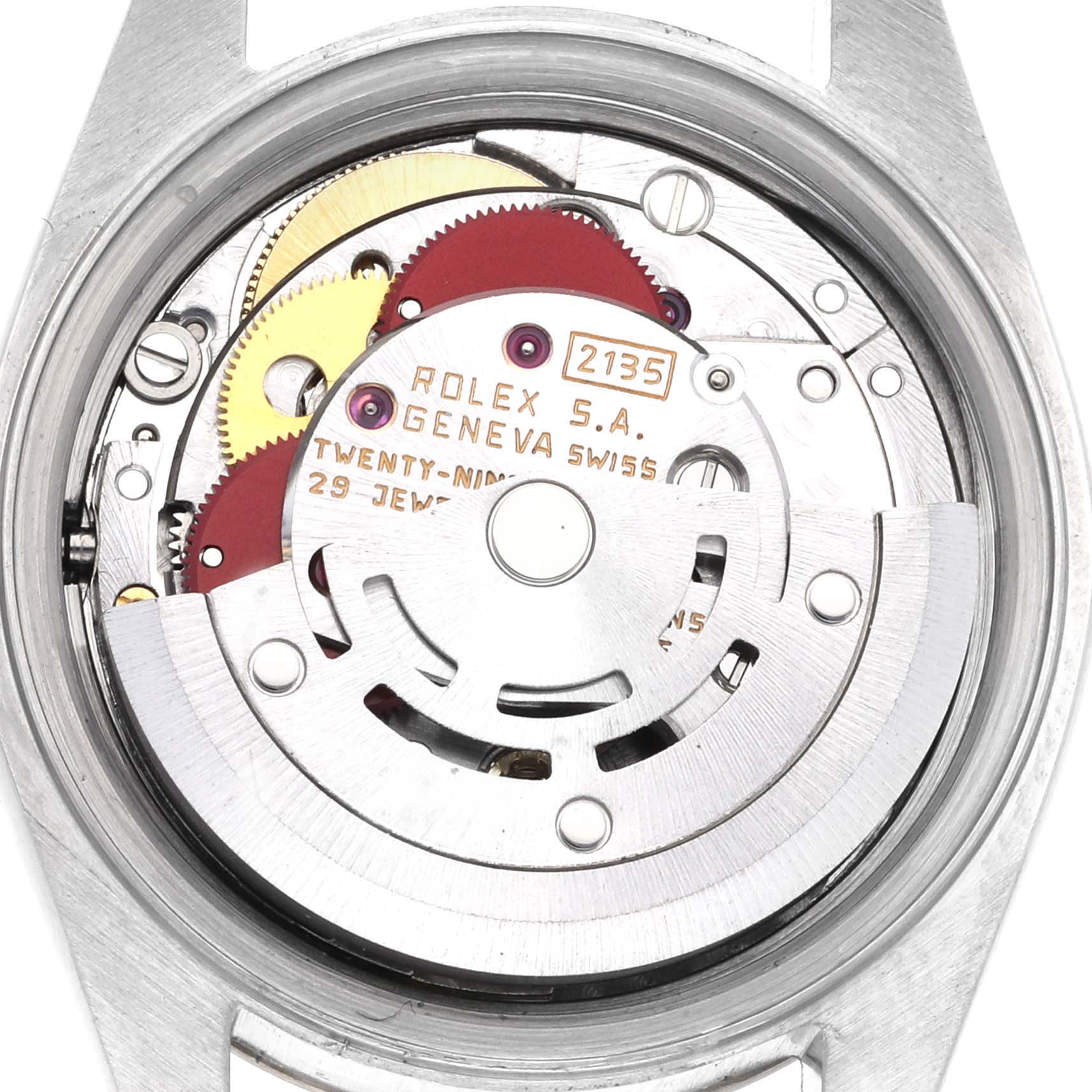 The image shows the movement of a Rolex Datejust 69173 Women's Steel and Gold (two tone) Champagne Dial 69173 Women's Steel and Gold (two tone) Champagne Dial watch from the back, highlighting the gears and rotor.