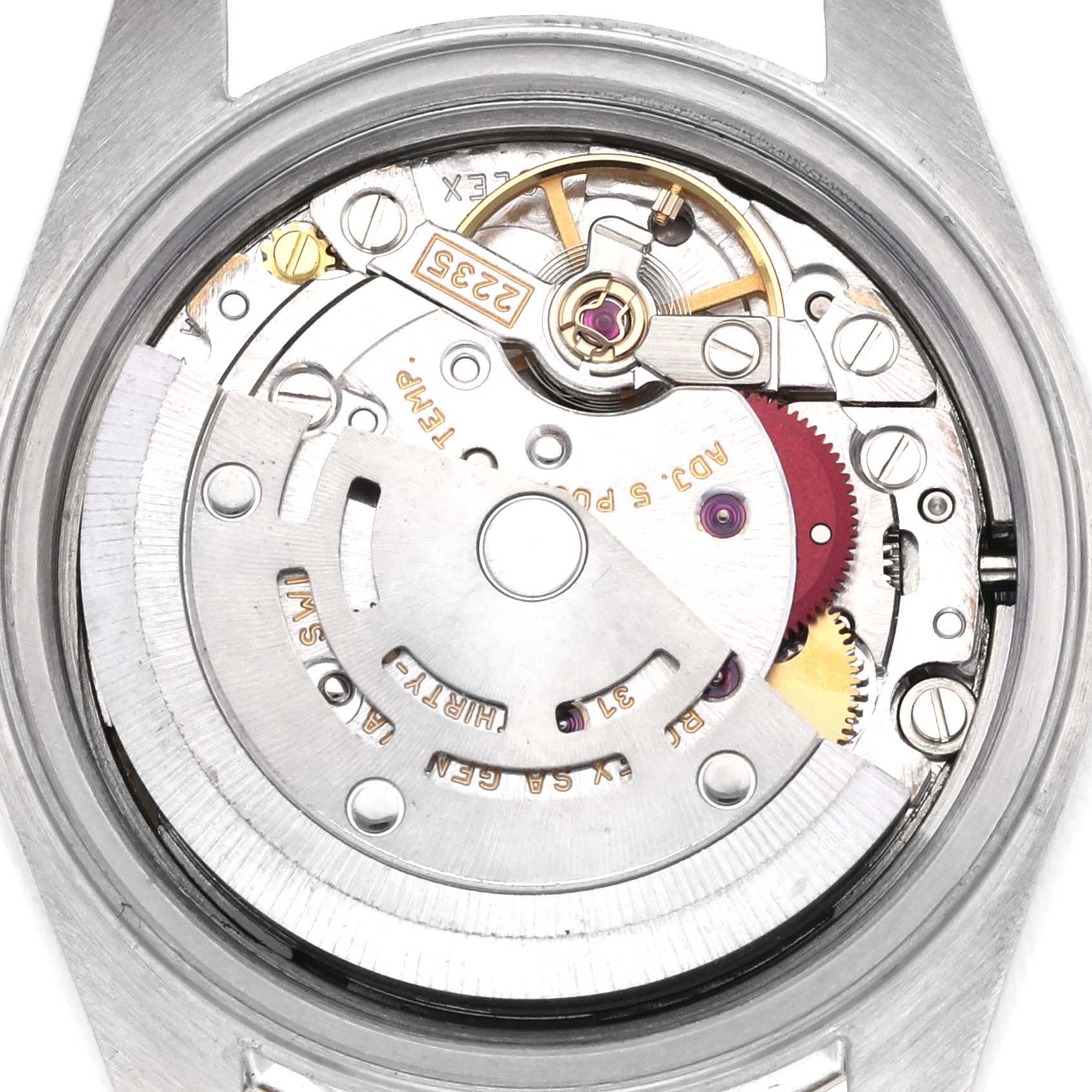 The image shows the back of a Rolex Datejust 79173 Women's Steel and Gold (two tone) Champagne Dial 79173 Women's Steel and Gold (two tone) Champagne Dial, displaying its intricate movement and internal components.