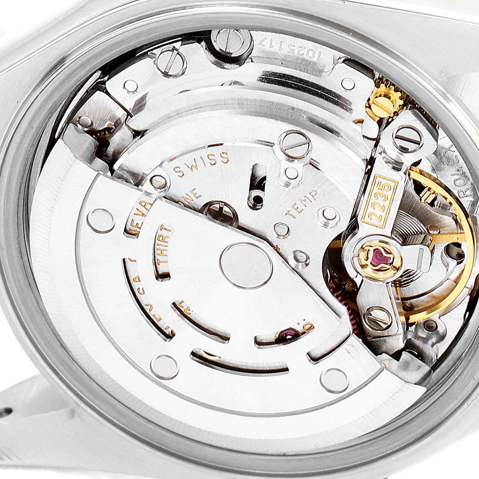 The image shows a close-up view of the movement mechanism of a Rolex Datejust 79173 Women's Steel and Gold (two tone) Pink Dial 79173 Women's Steel and Gold (two tone) Pink Dial watch.