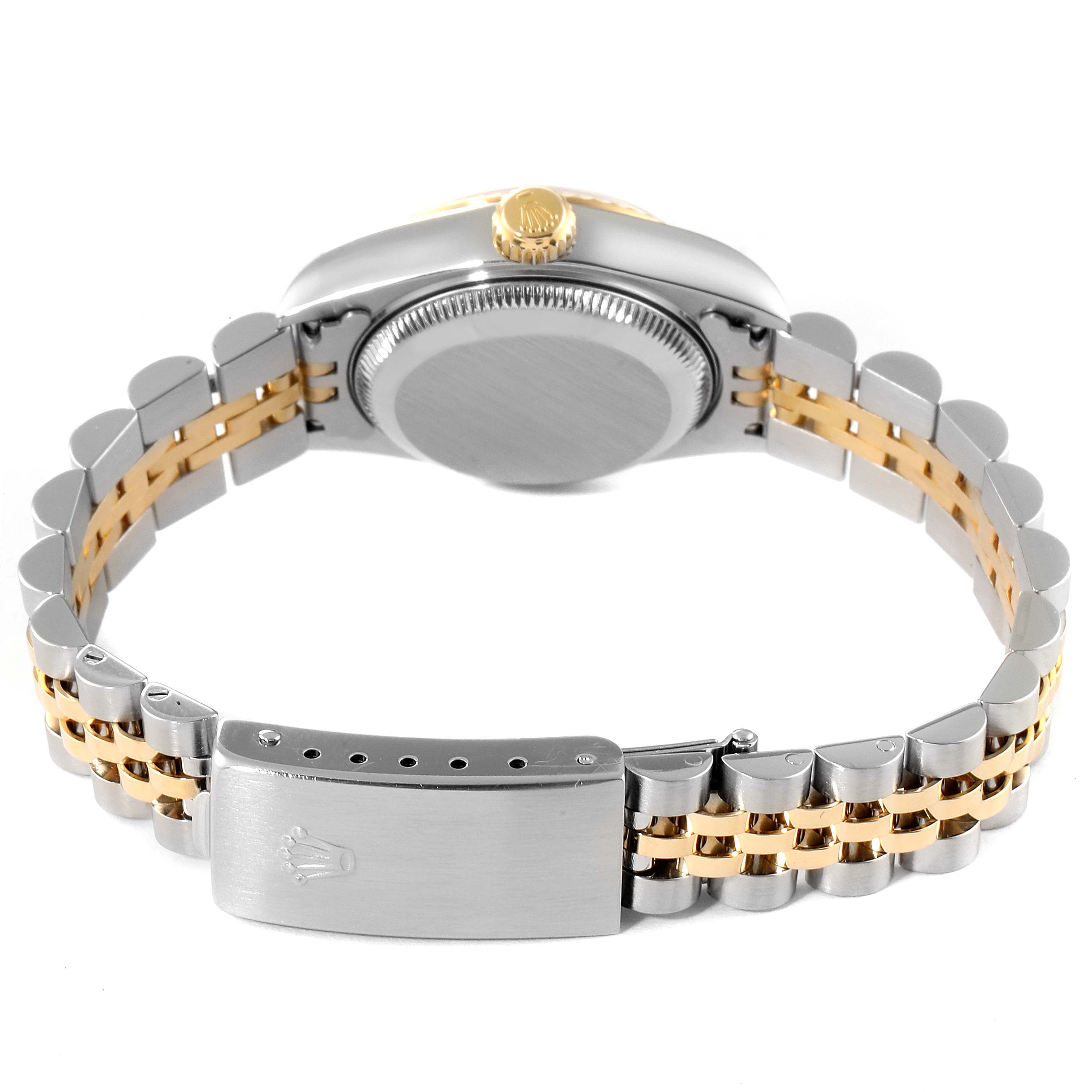 This image shows the back of a Rolex Datejust 79173 Women's Steel and Gold (two tone) Pink Dial 79173 Women's Steel and Gold (two tone) Pink Dial watch, highlighting its bracelet and clasp.