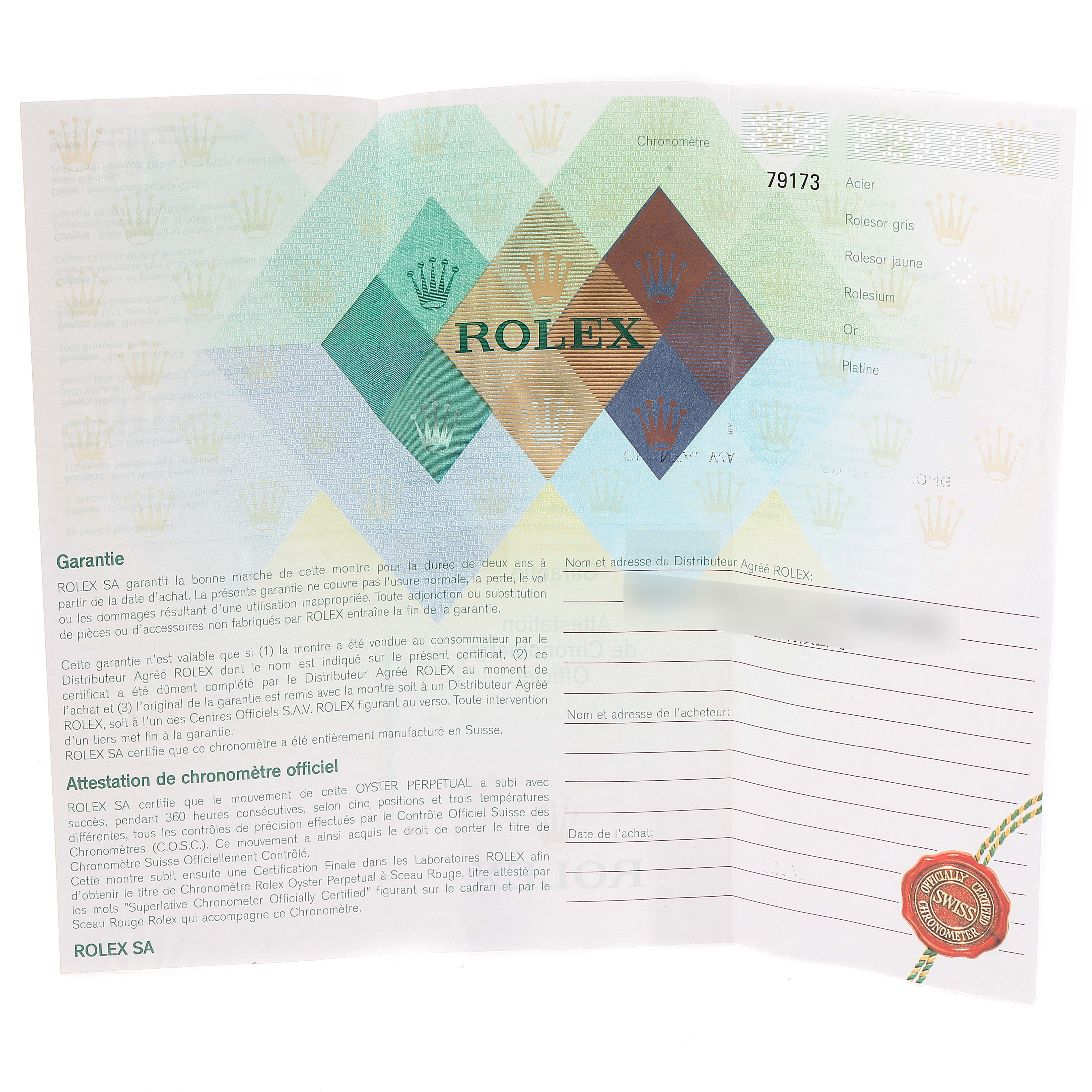 This is the warranty card for a Rolex Datejust 79173 Women's Steel and Gold (two tone) Pink Dial 79173 Women's Steel and Gold (two tone) Pink Dial watch, displaying details and the official Rolex seal.