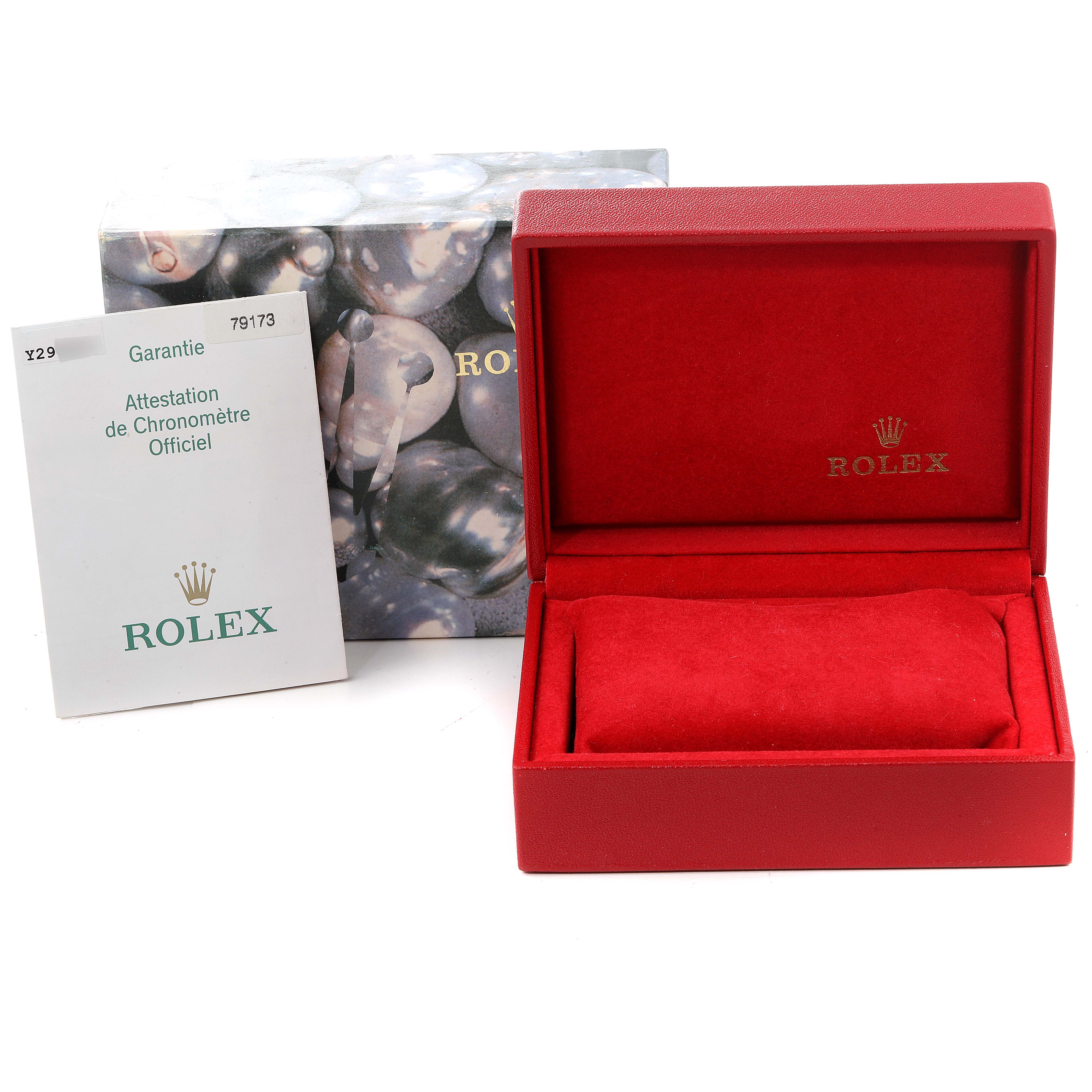 This image shows the box, packaging, and warranty paper for a Rolex Datejust 79173 Women's Steel and Gold (two tone) Pink Dial 79173 Women's Steel and Gold (two tone) Pink Dial model.