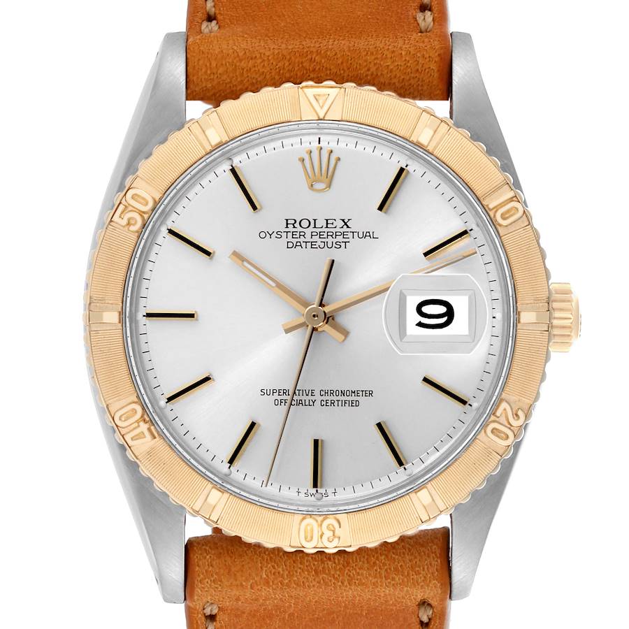 The Rolex Vintage Collection watch is shown from the front, highlighting the dial, bezel, and leather strap.